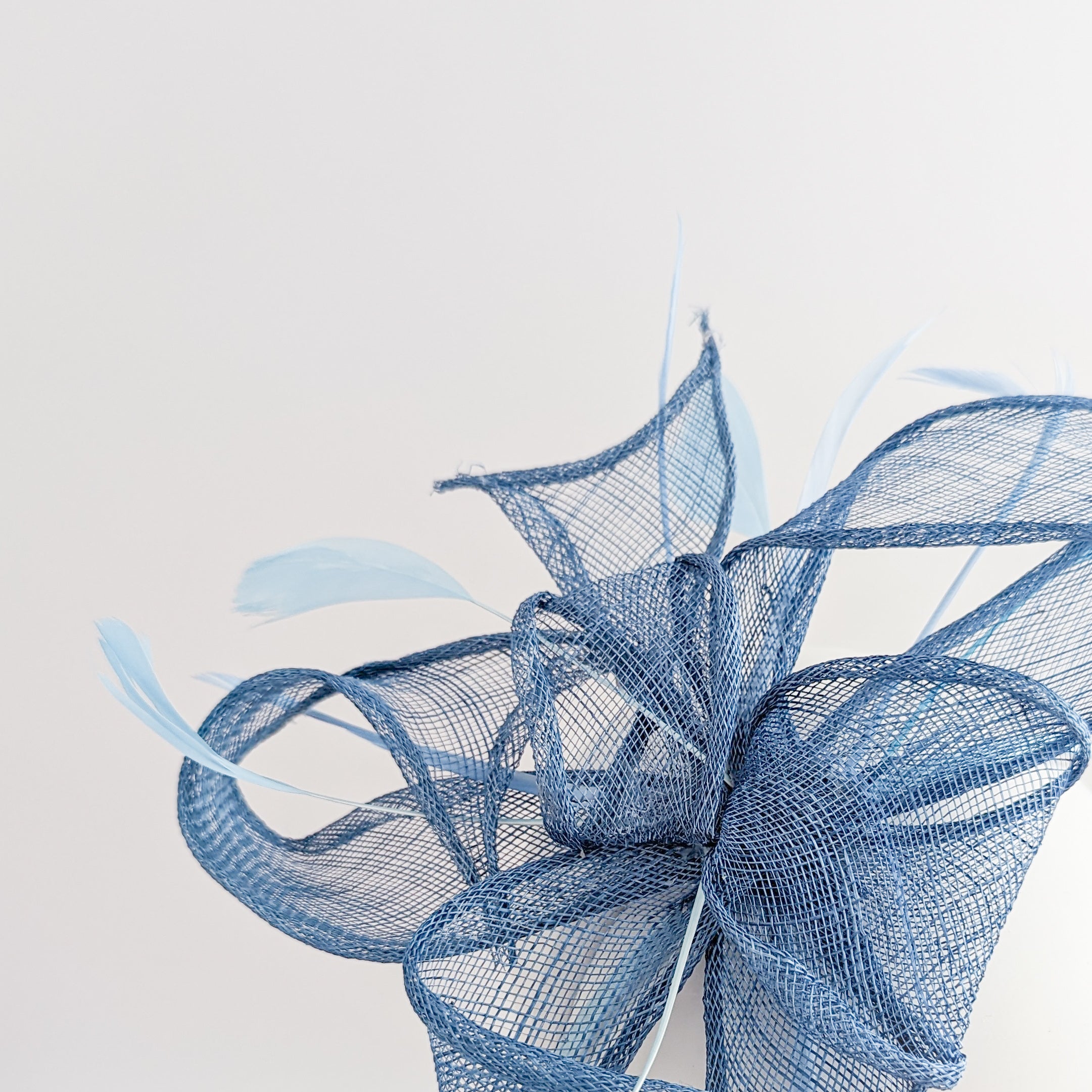 Cornflower blue feather fascinator hat