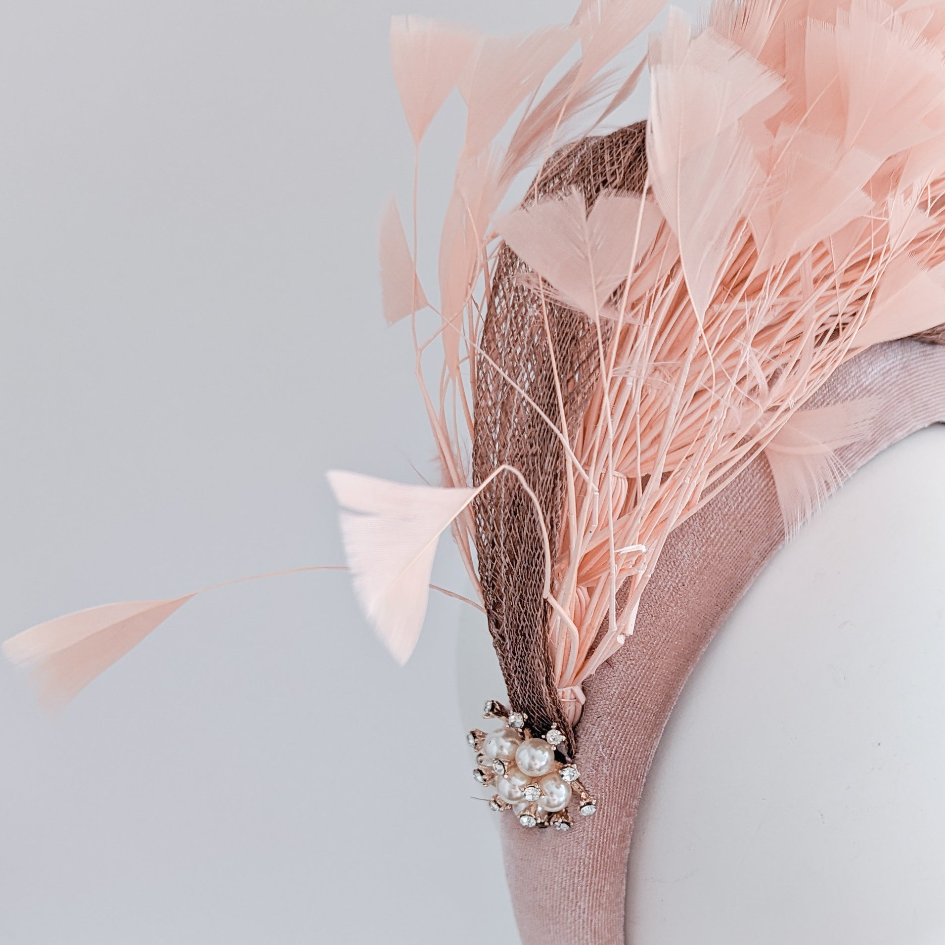 Dusty blush pink feather padded velvet headband fascinator