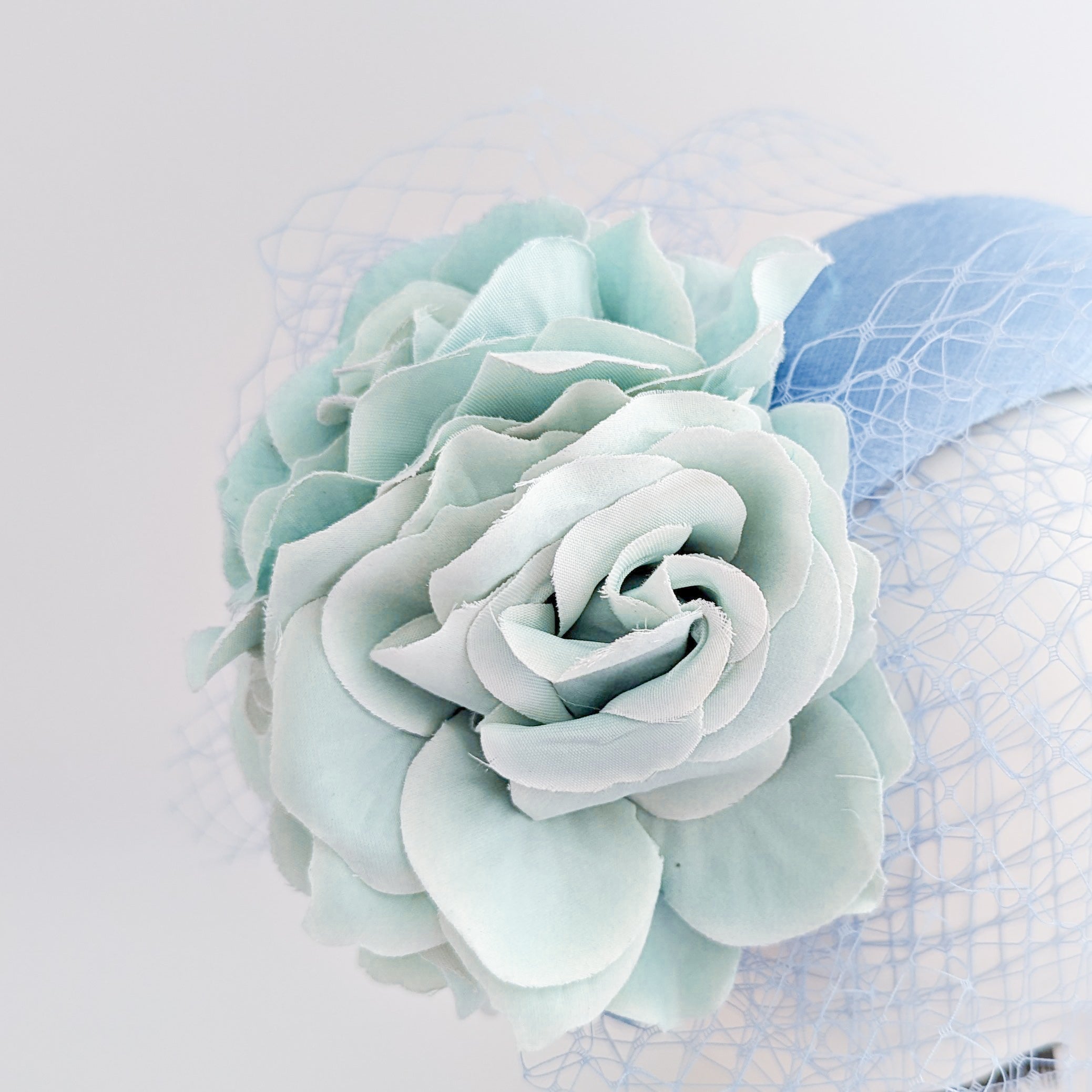 Light cornflower blue aquamarine flower padded velvet headband fascinator