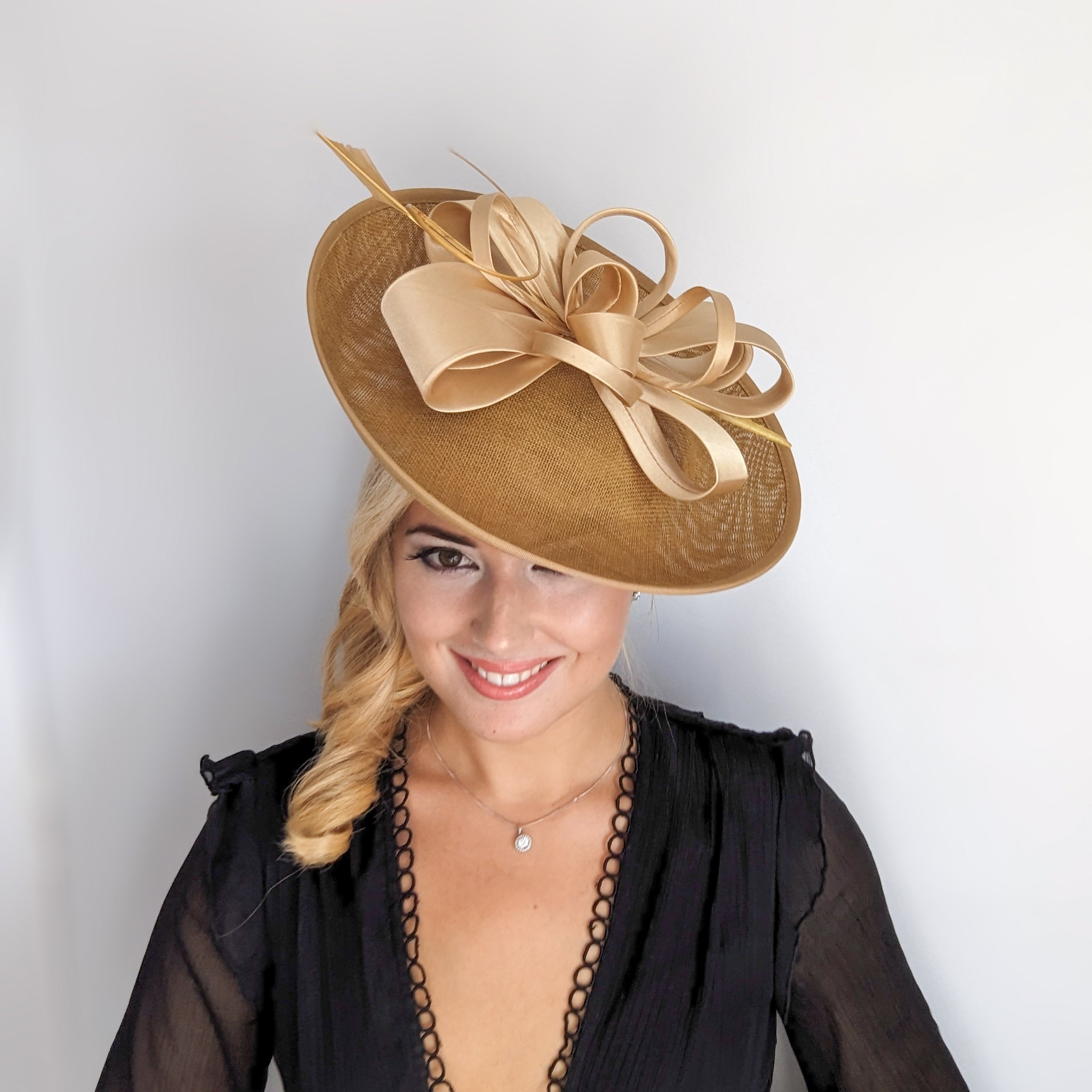 Gold feather large saucer disc fascinator hat