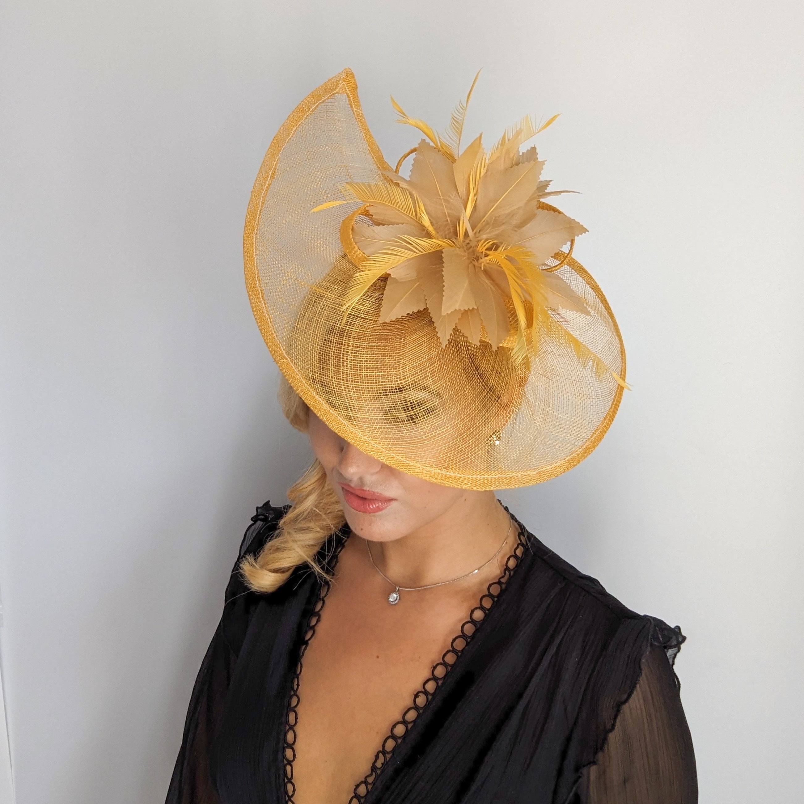 Golden yellow feather large teardrop fascinator hat