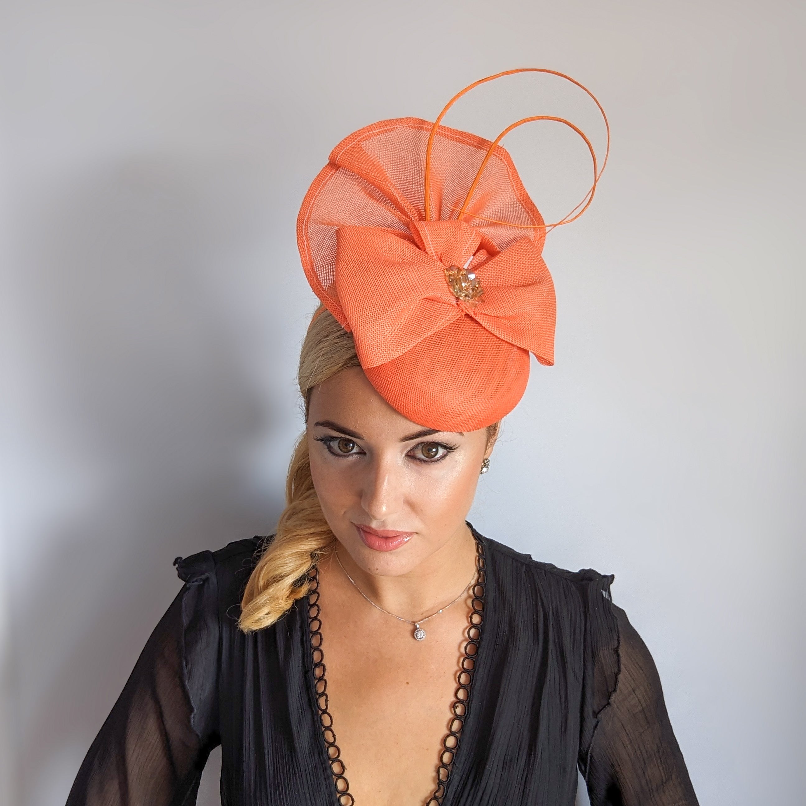 Coral orange crystal bow fascinator hat