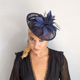 Navy blue feather disc saucer fascinator hat