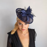 Navy blue feather disc saucer fascinator hat