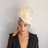 Cream flower feather disc saucer fascinator hat