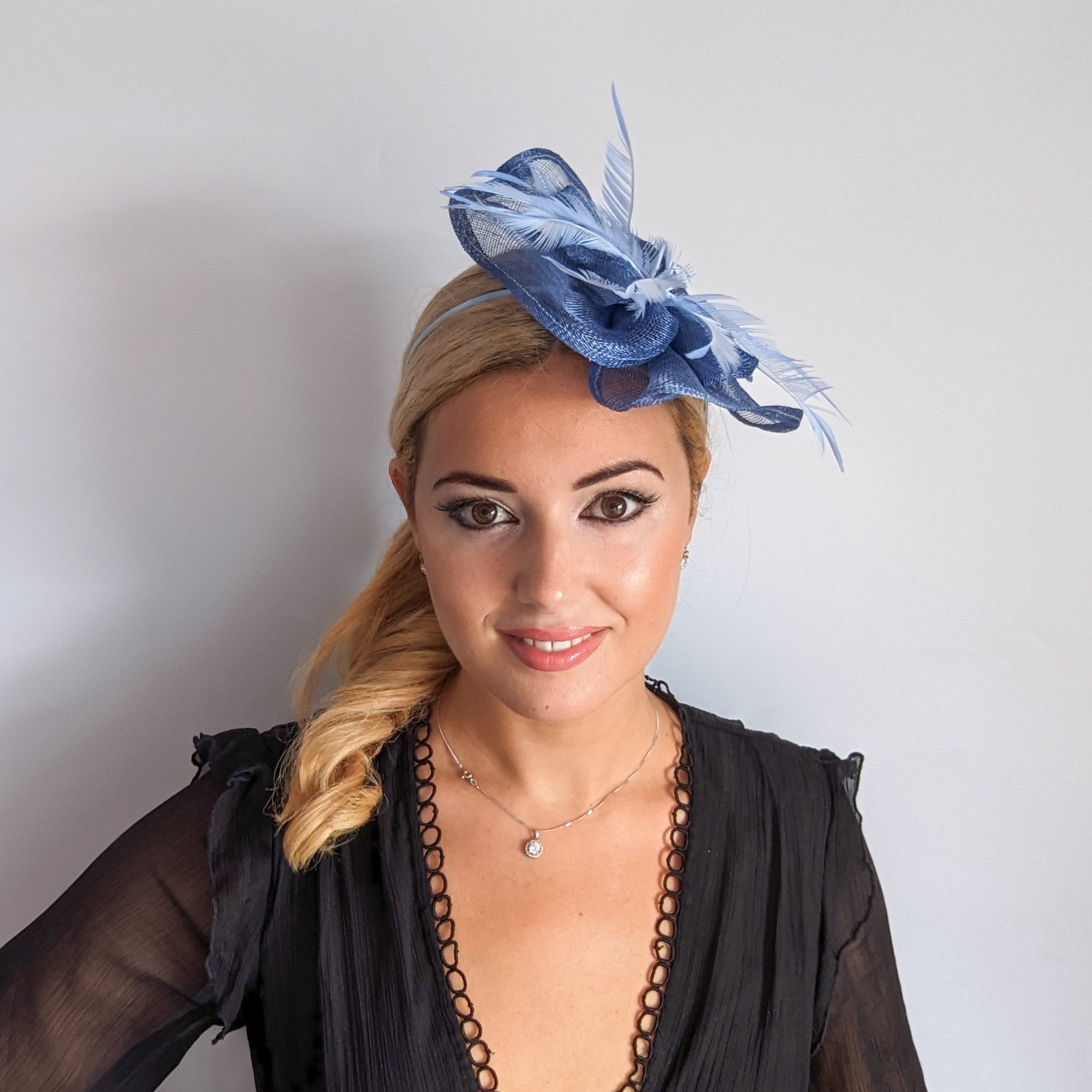 Cornflower blue feather fascinator hat