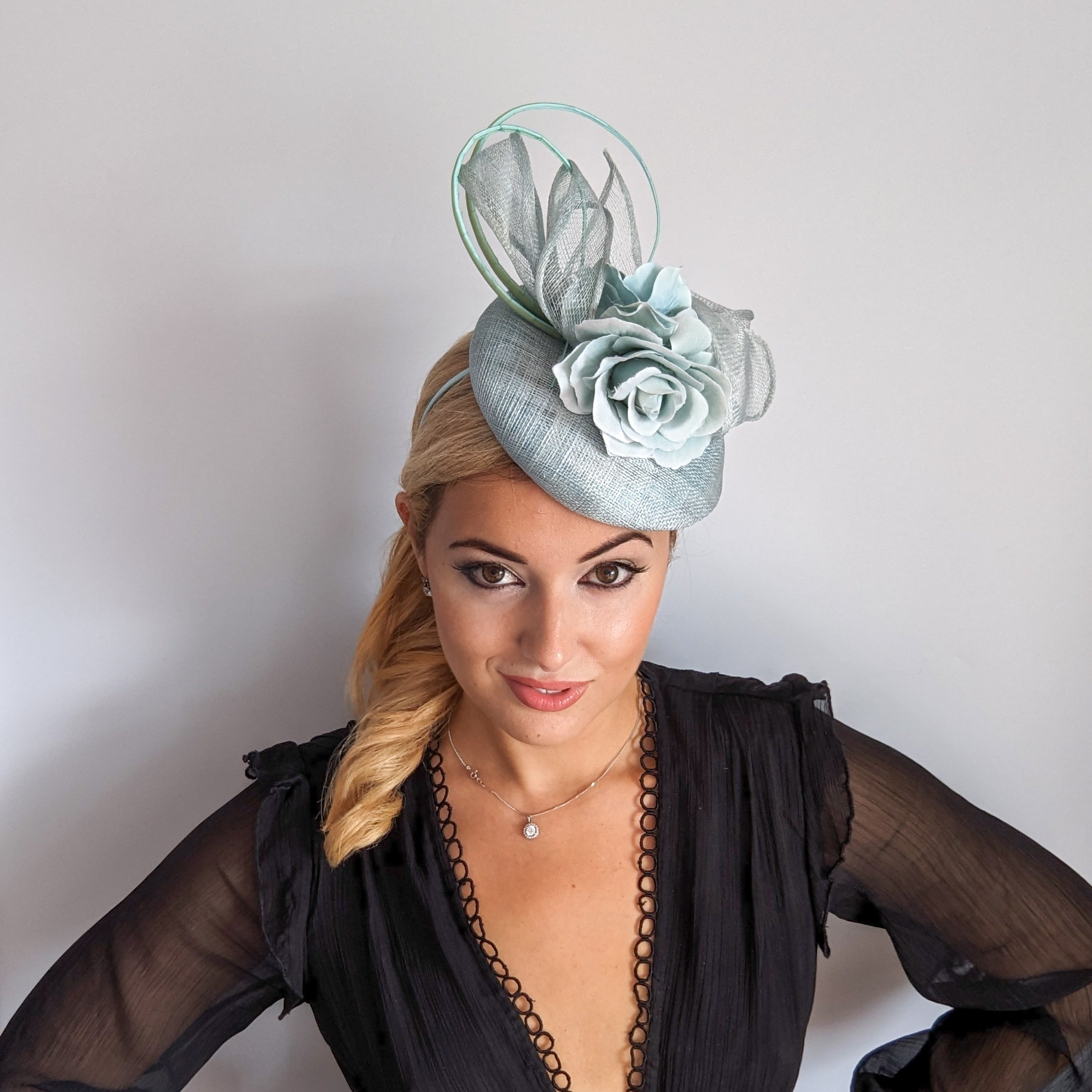 Aquamarine blue flower fascinator hat