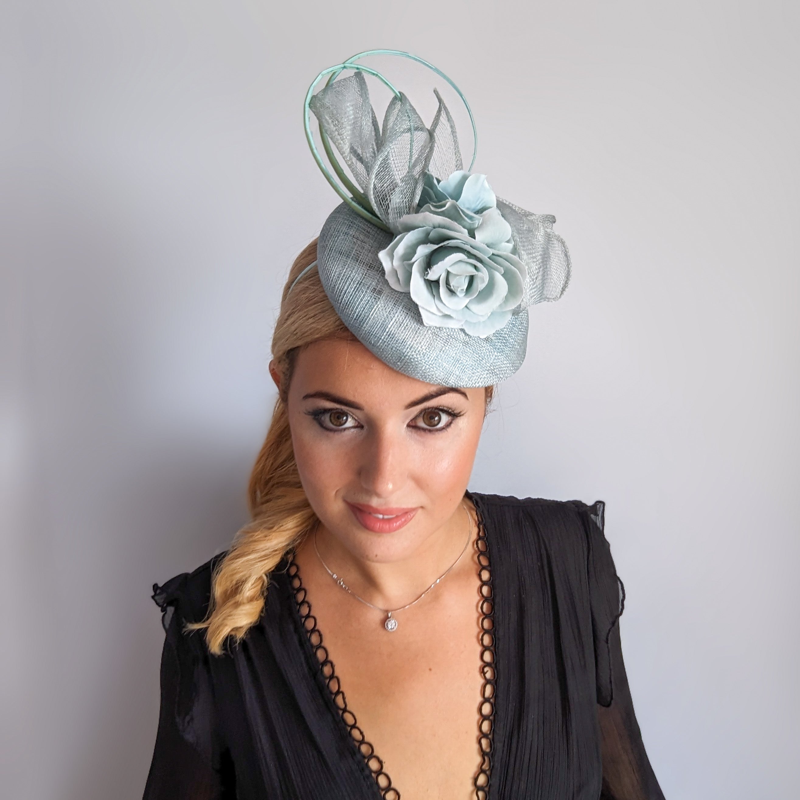 Aquamarine blue flower fascinator hat