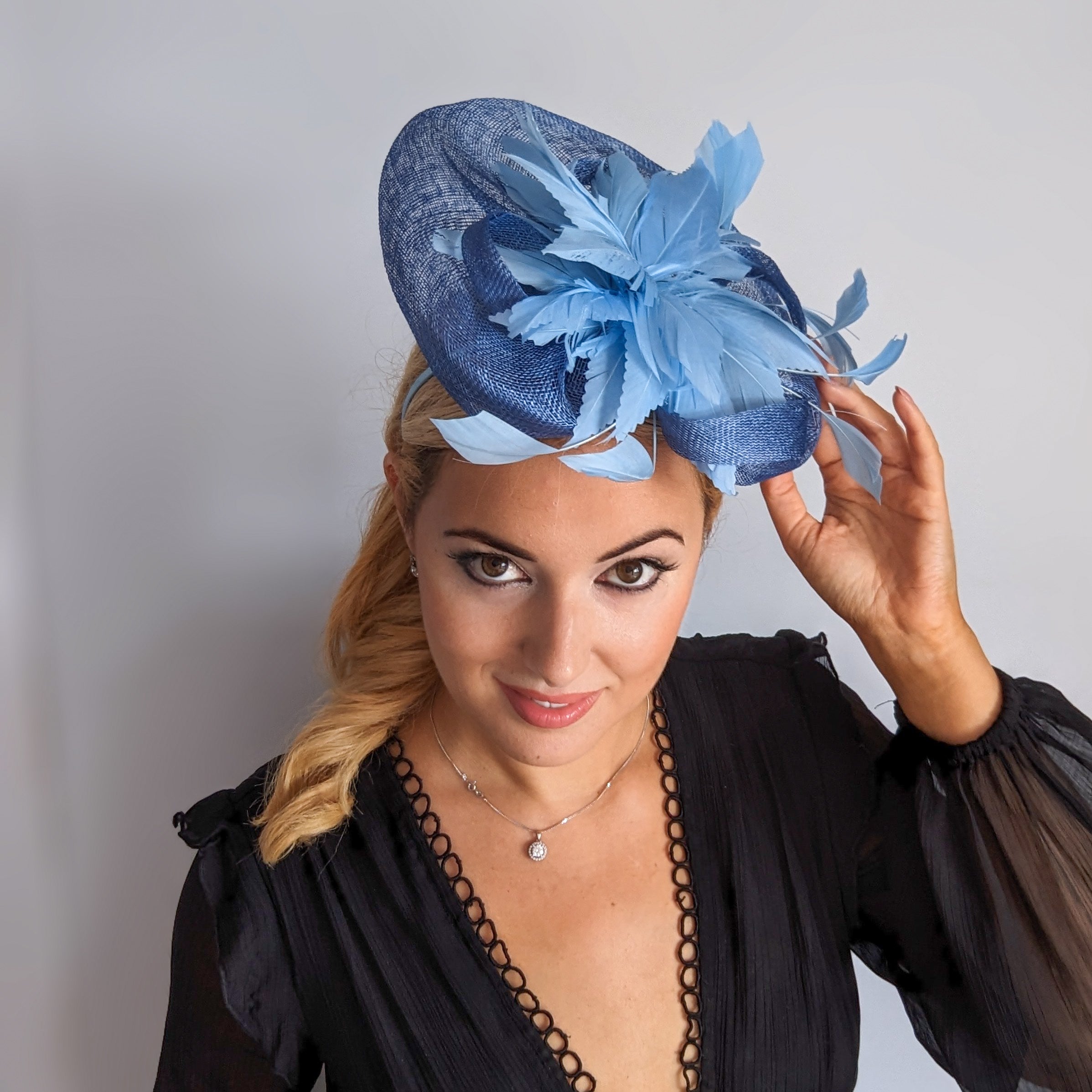 Cornflower blue feather fascinator hat