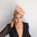 Light pink disc saucer fascinator hat