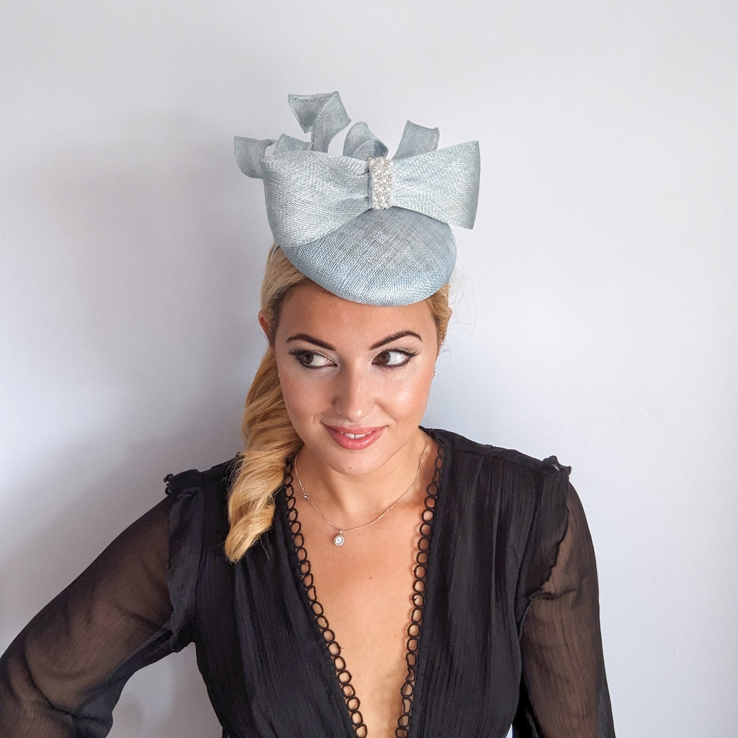 Aquamarine blue crystal bow fascinator hat