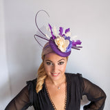 Cadbury purple flower feather fascinator hat