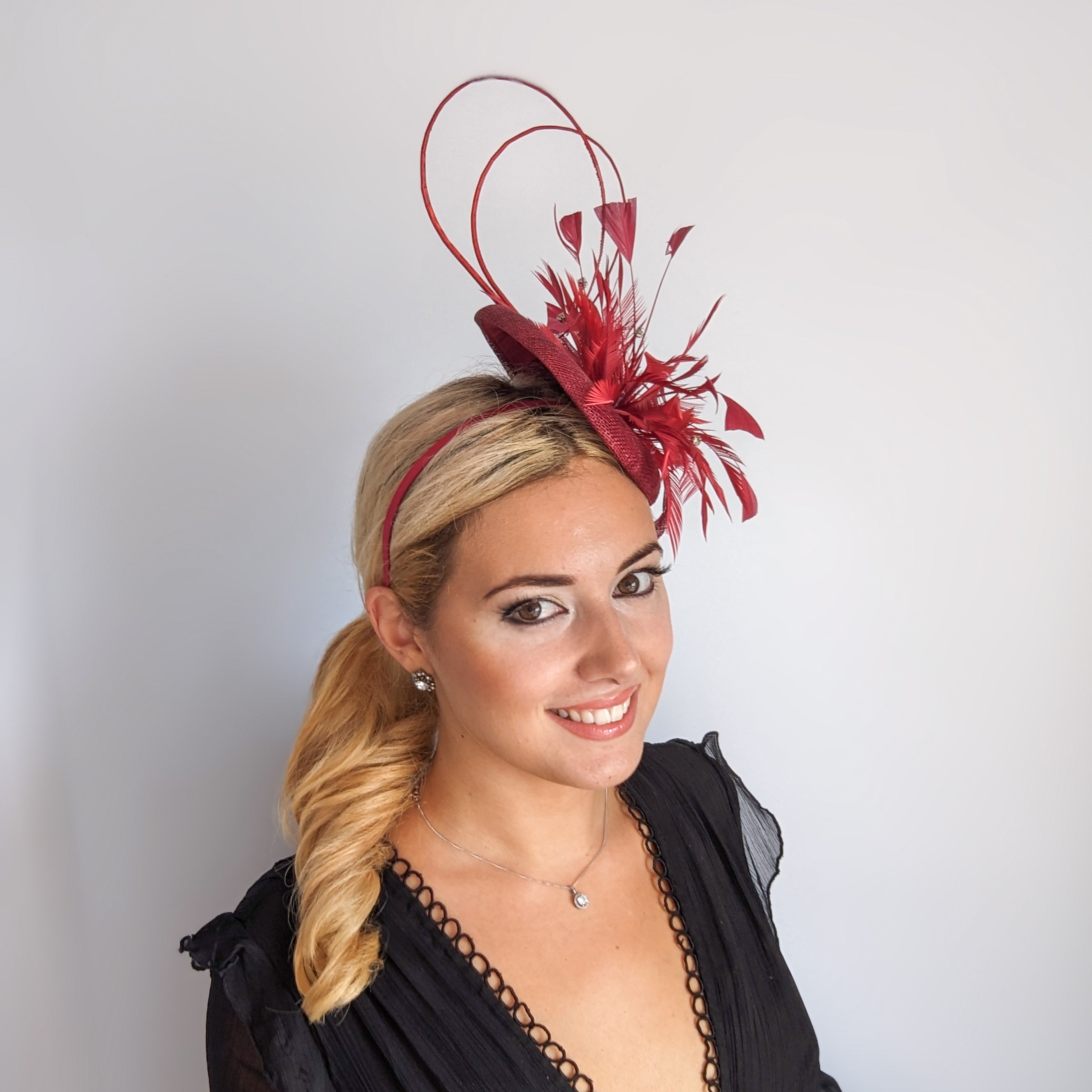 Burgundy crystal feather fascinator hat