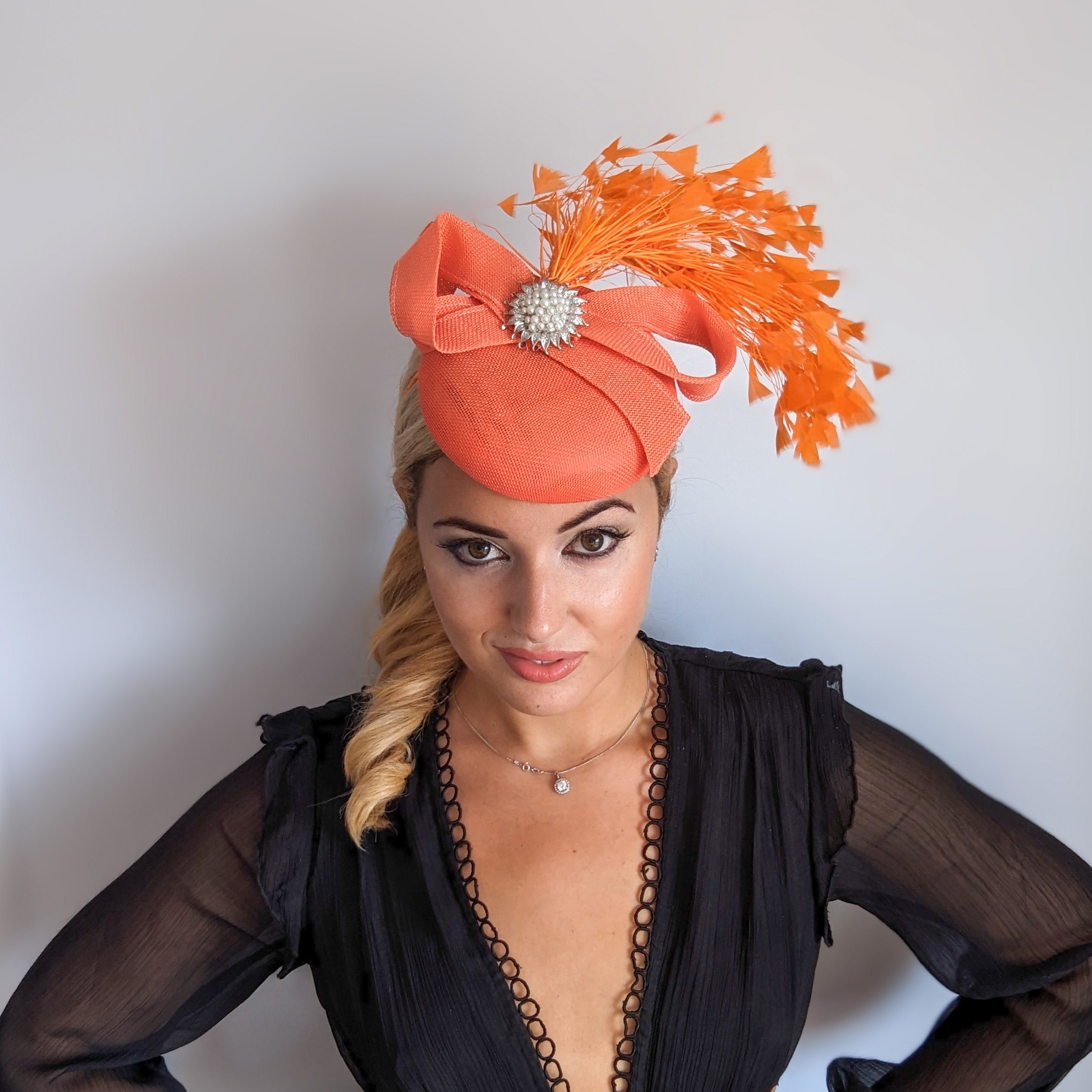 Coral orange feather pearl fascinator hat