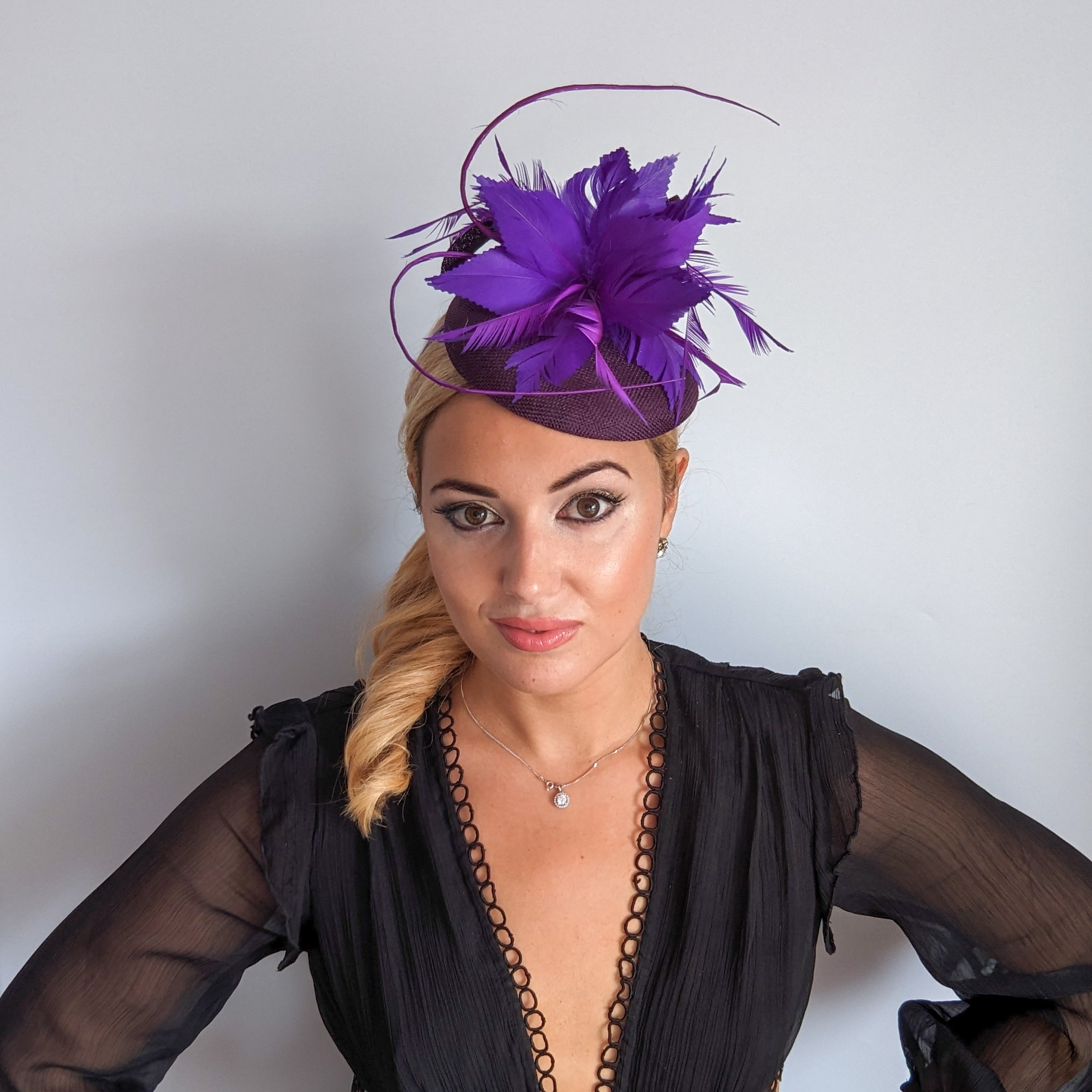 Plum and cadbury purple feather fascinator hat