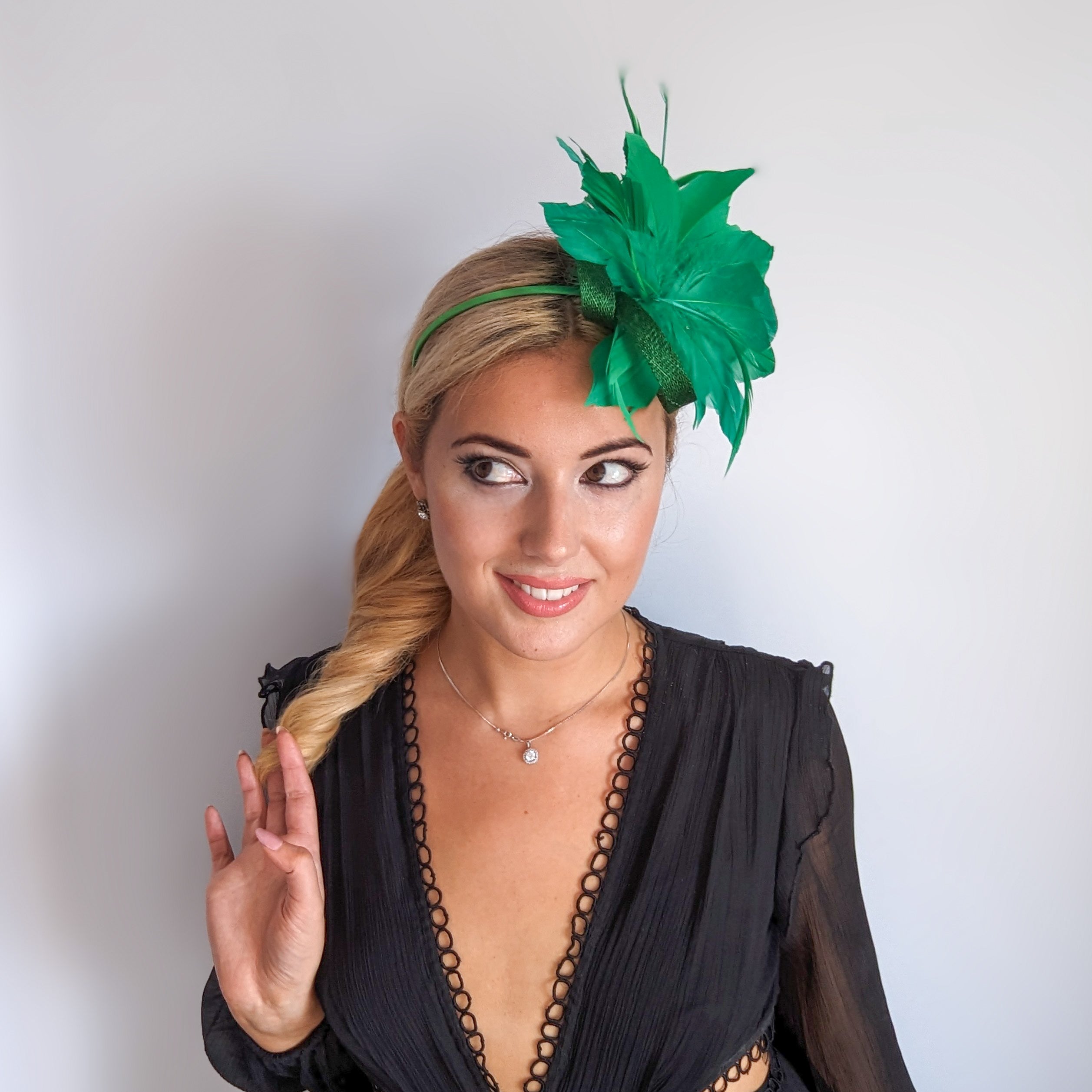 Shamrock green feather fascinator hat