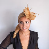 Golden yellow feather fascinator hat