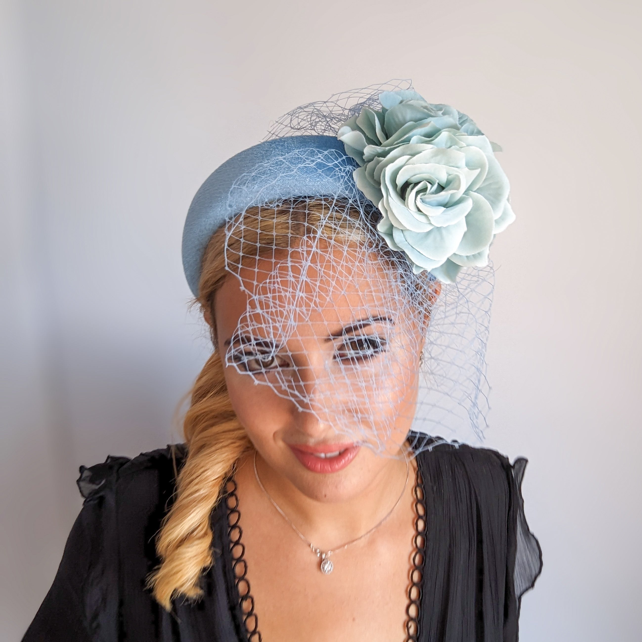 Light cornflower blue aquamarine flower padded velvet headband fascinator