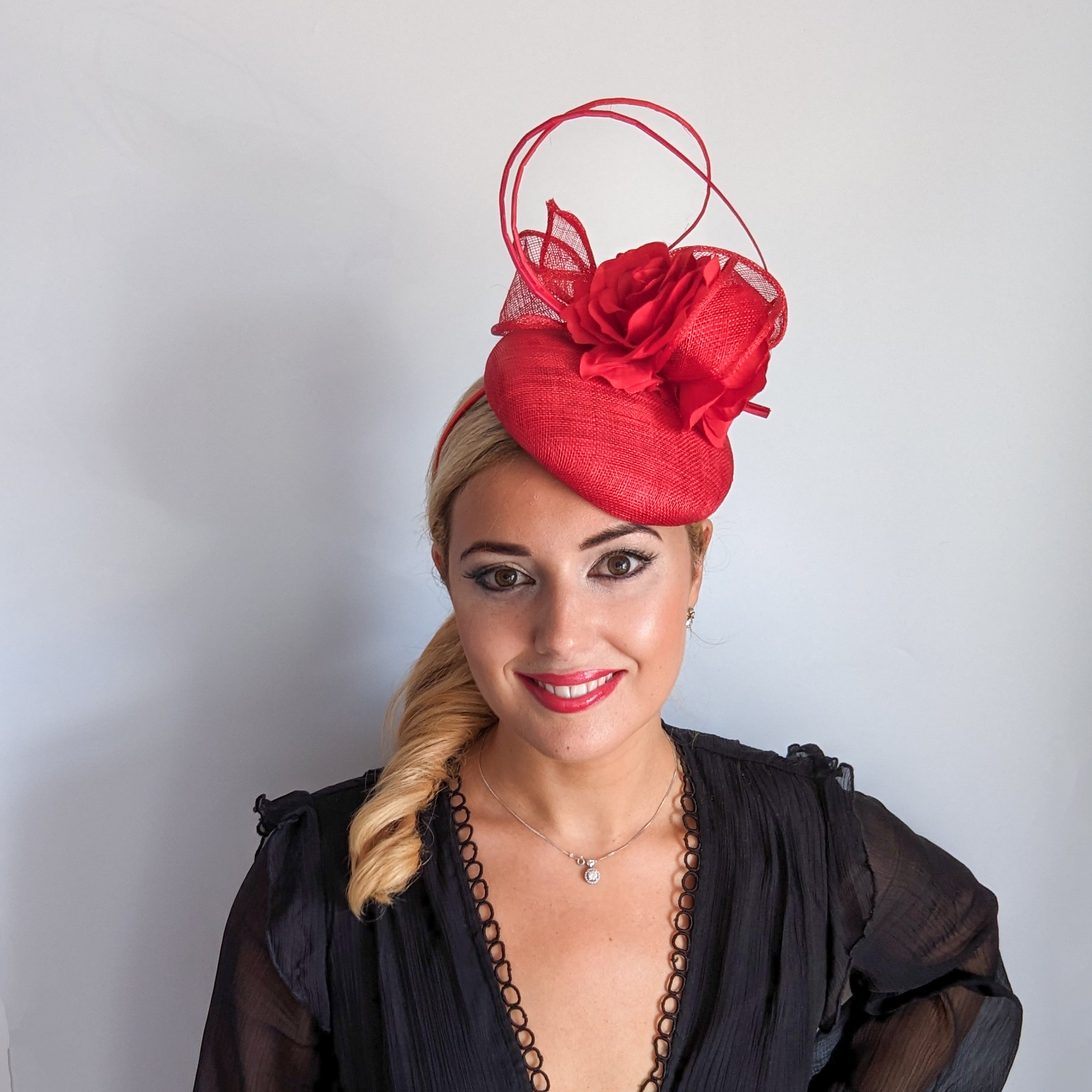 Red flower fascinator hat