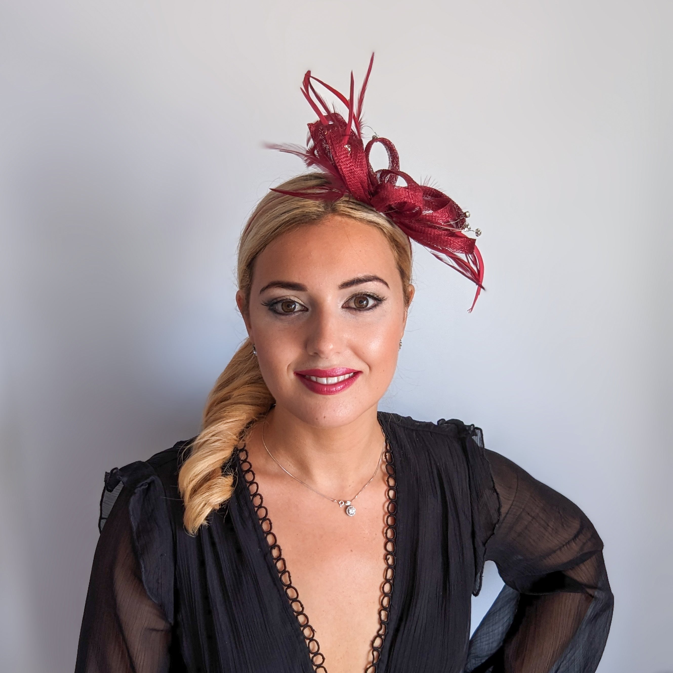 Burgundy crystal feather fascinator hat