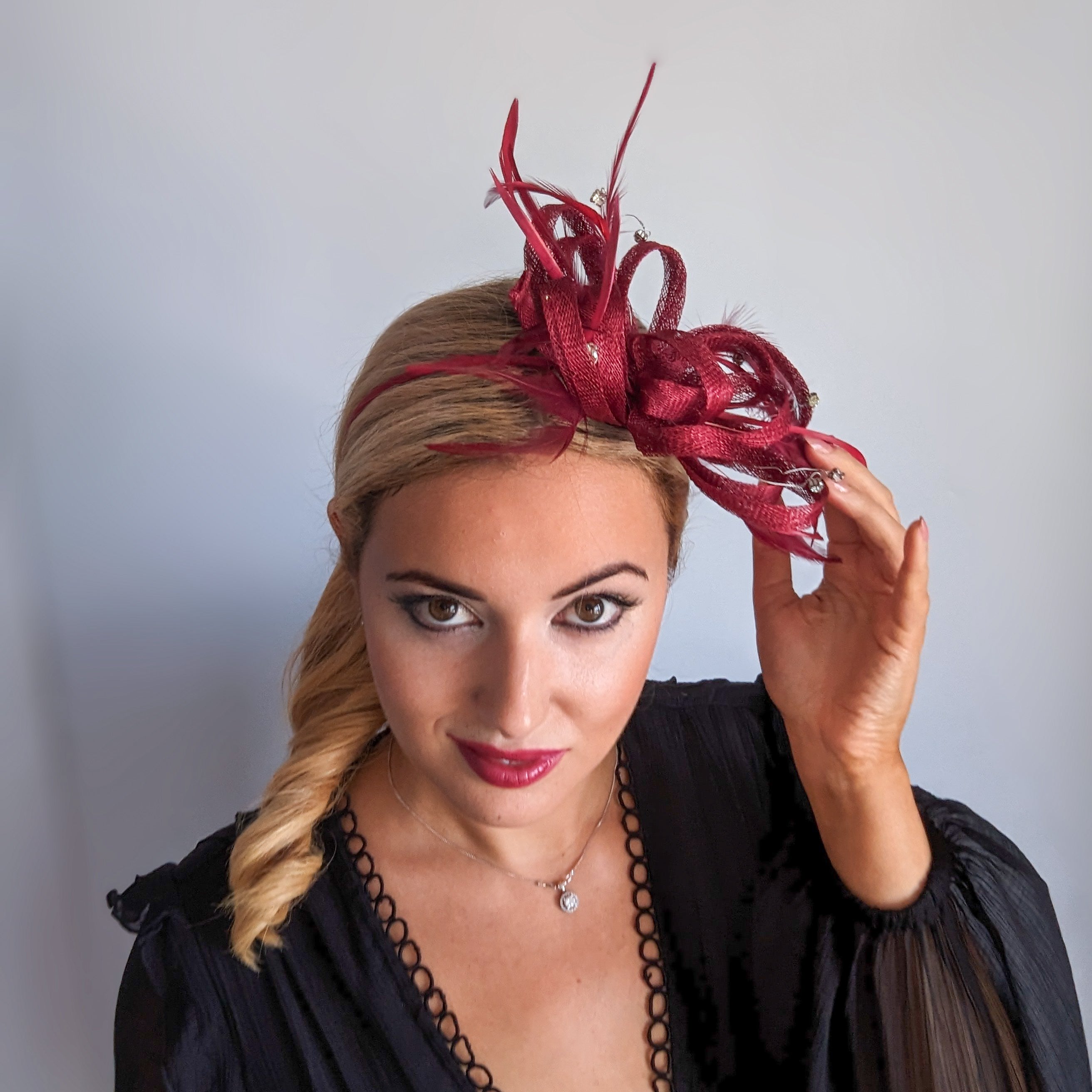 Burgundy crystal feather fascinator hat