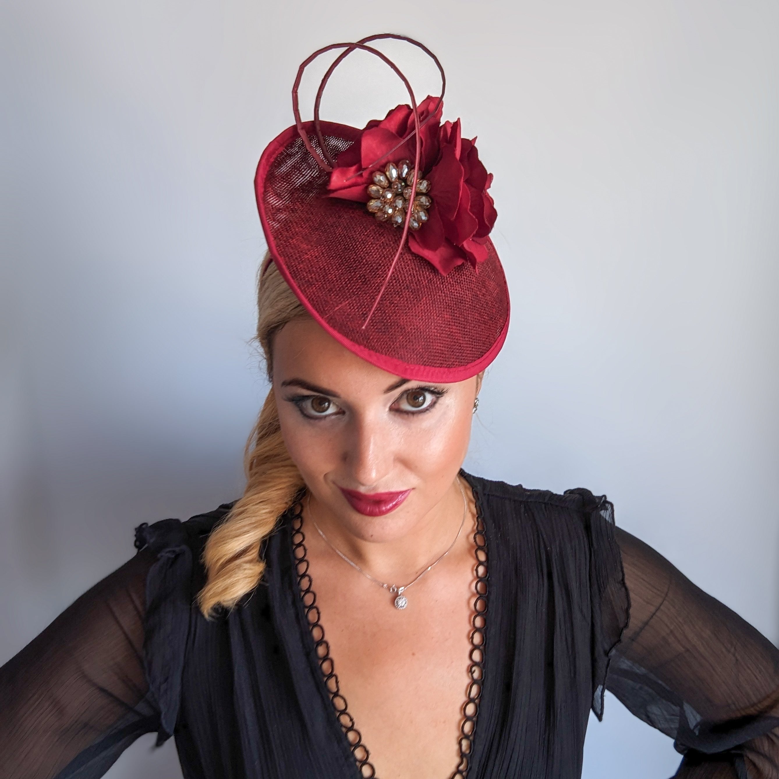 Burgundy flower disc saucer fascinator hat