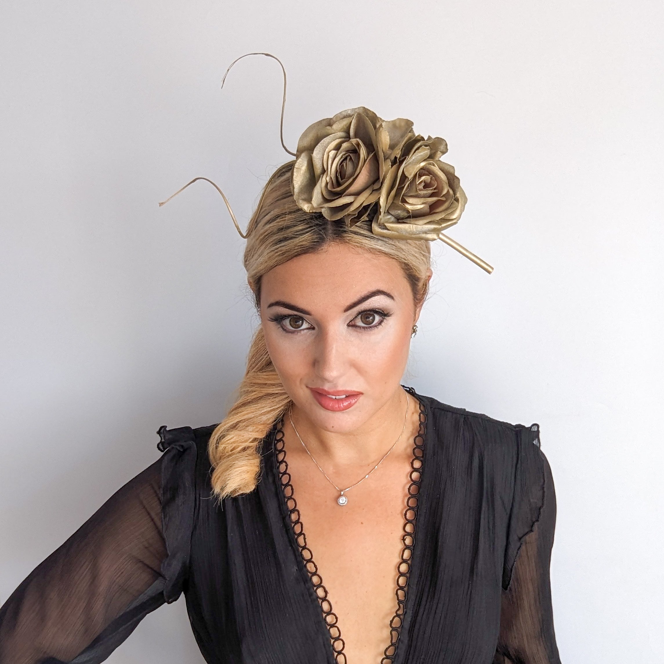 Gold shimmer rose flower fascinator hat