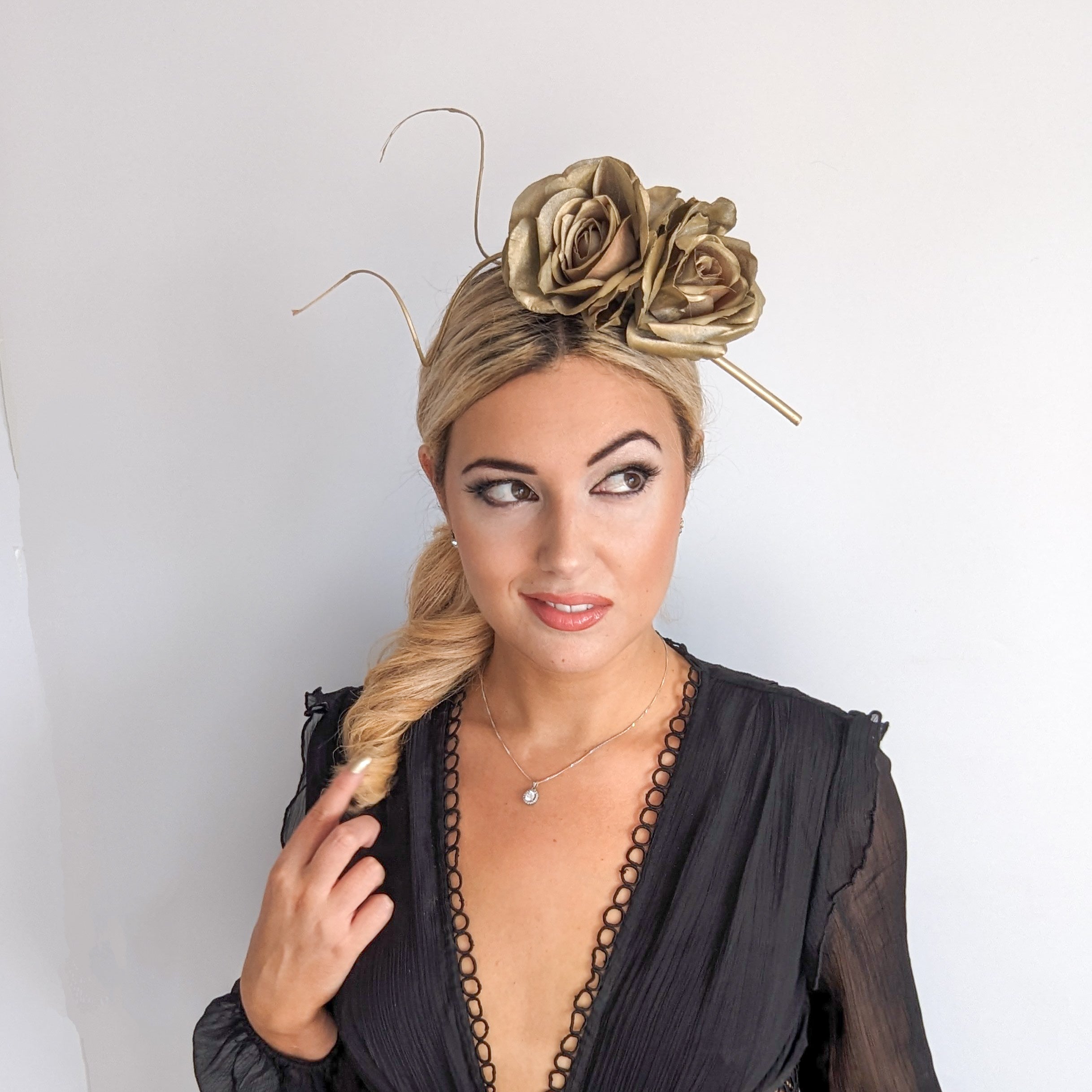 Gold shimmer rose flower fascinator hat