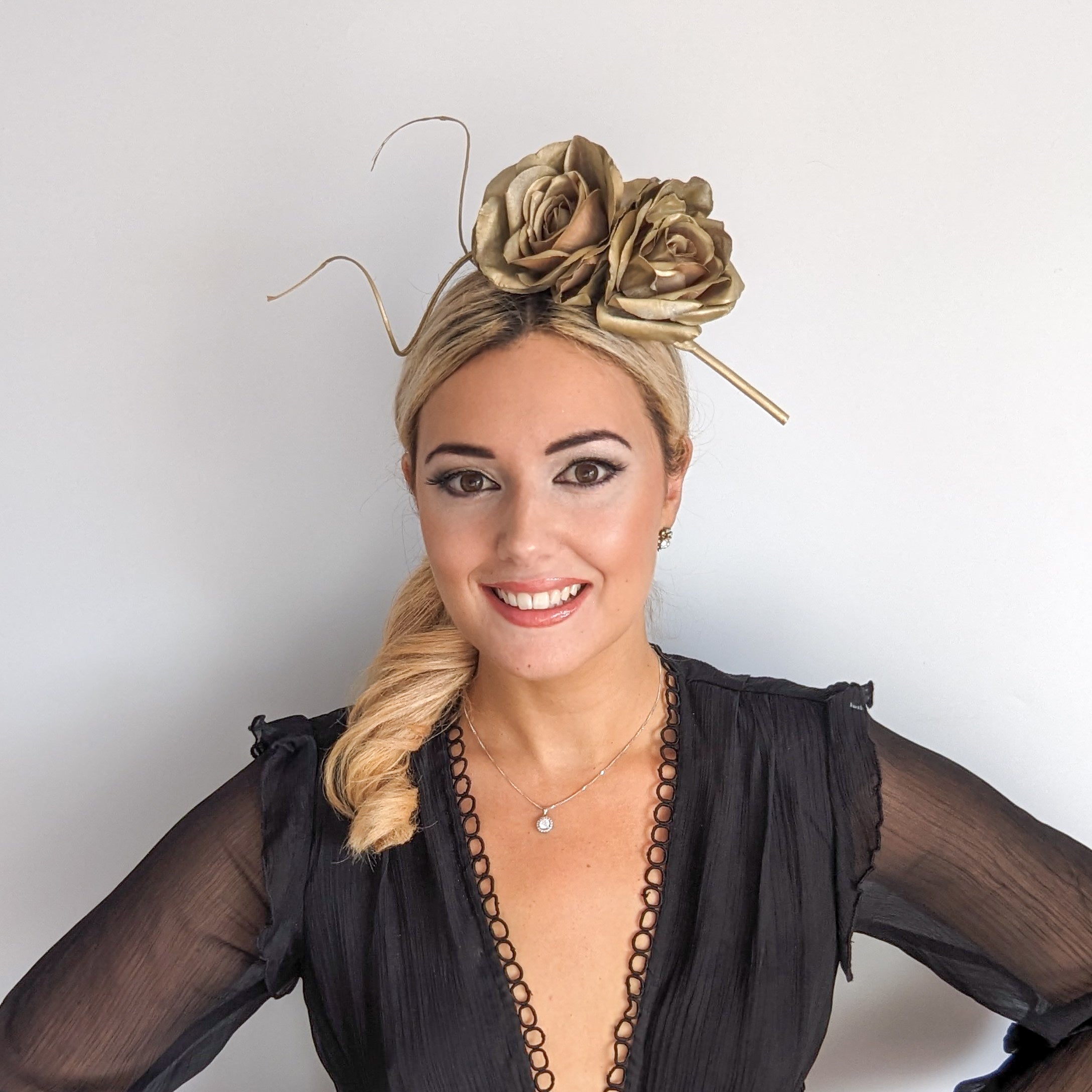 Gold shimmer rose flower fascinator hat