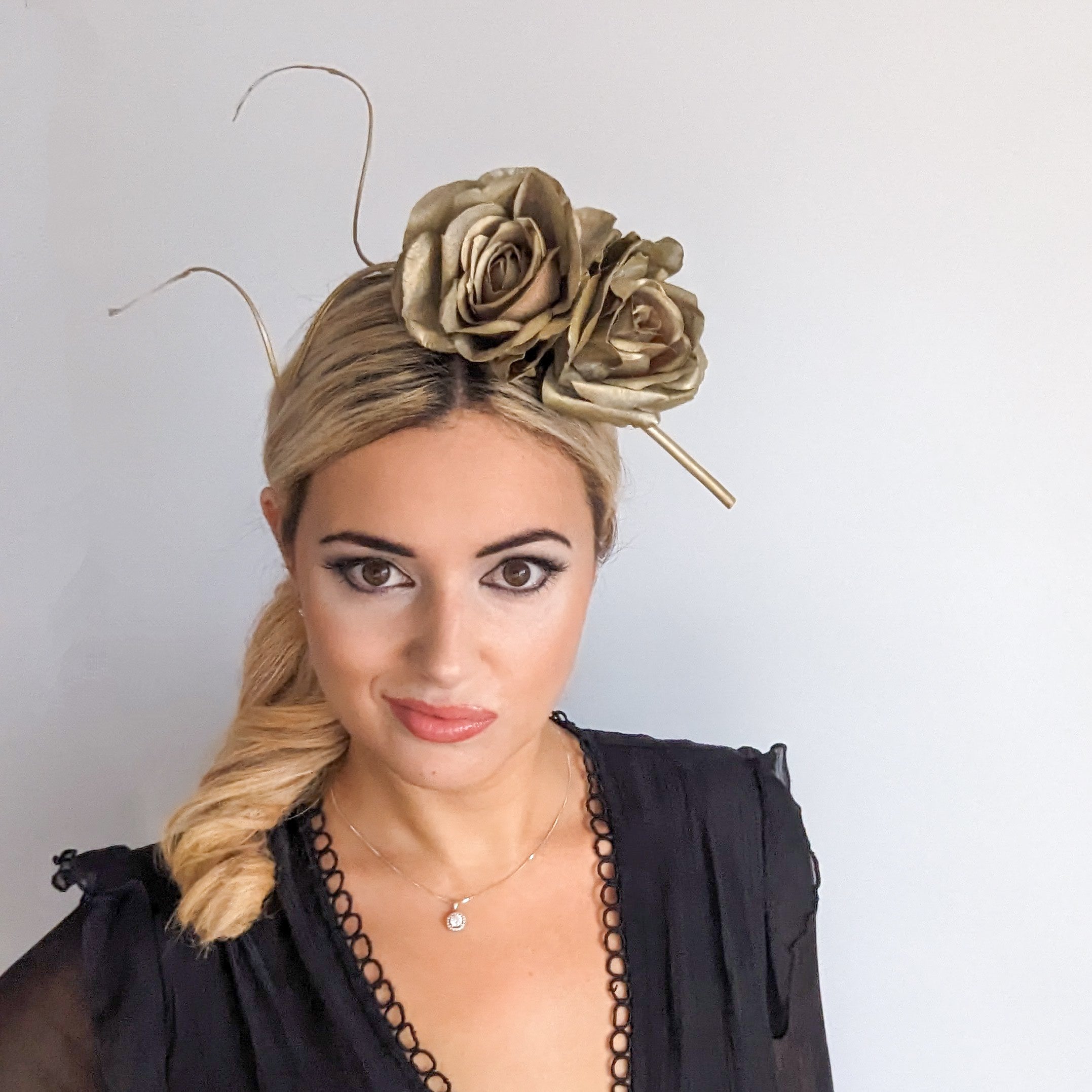 Gold shimmer rose flower fascinator hat