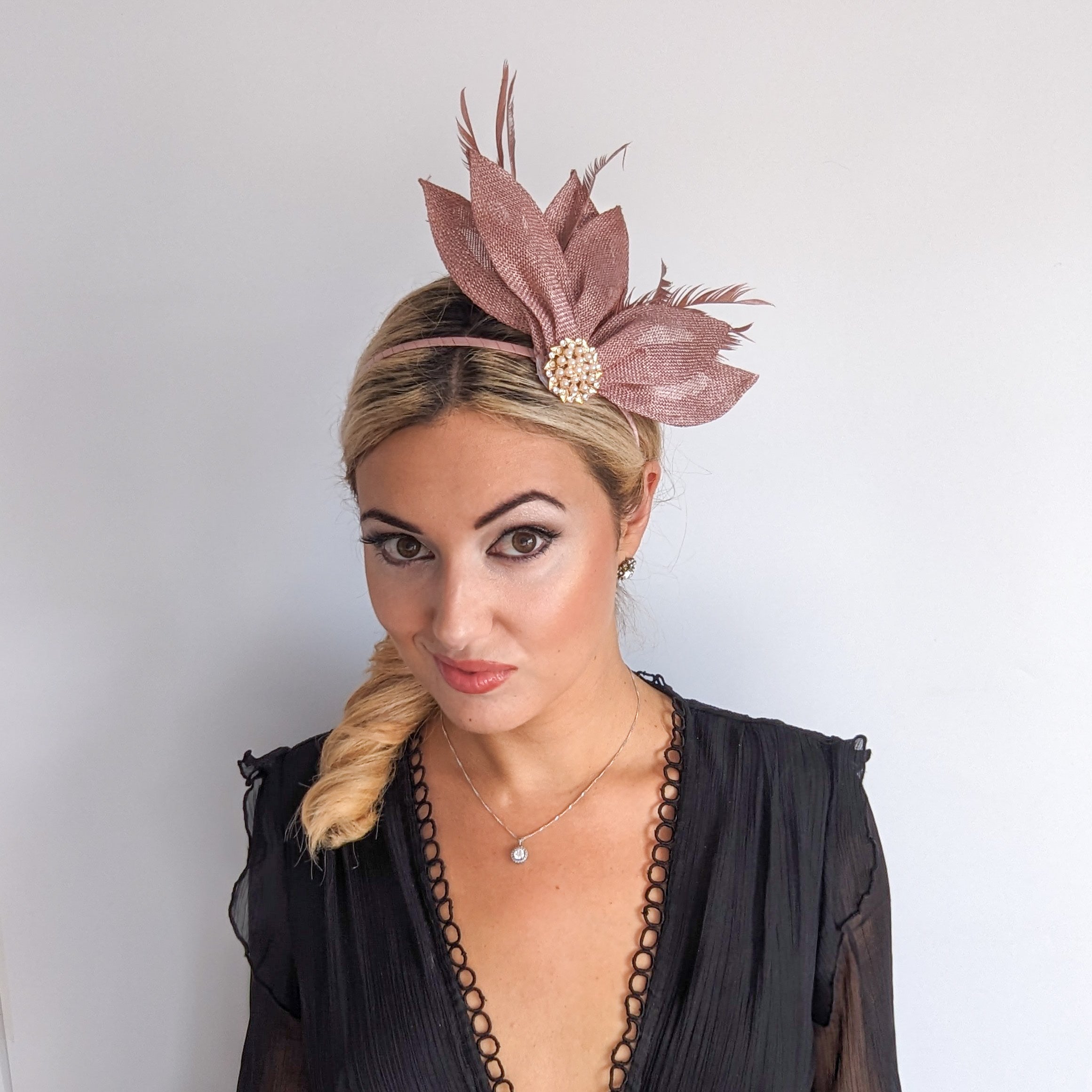 Rose gold shimmer feather petal fan fascinator hat