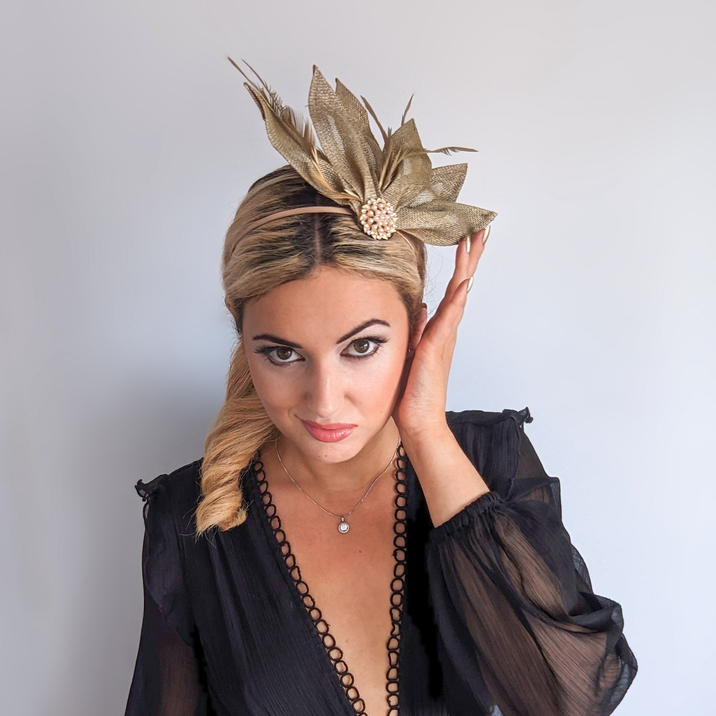 Gold shimmer feather petal fan fascinator hat