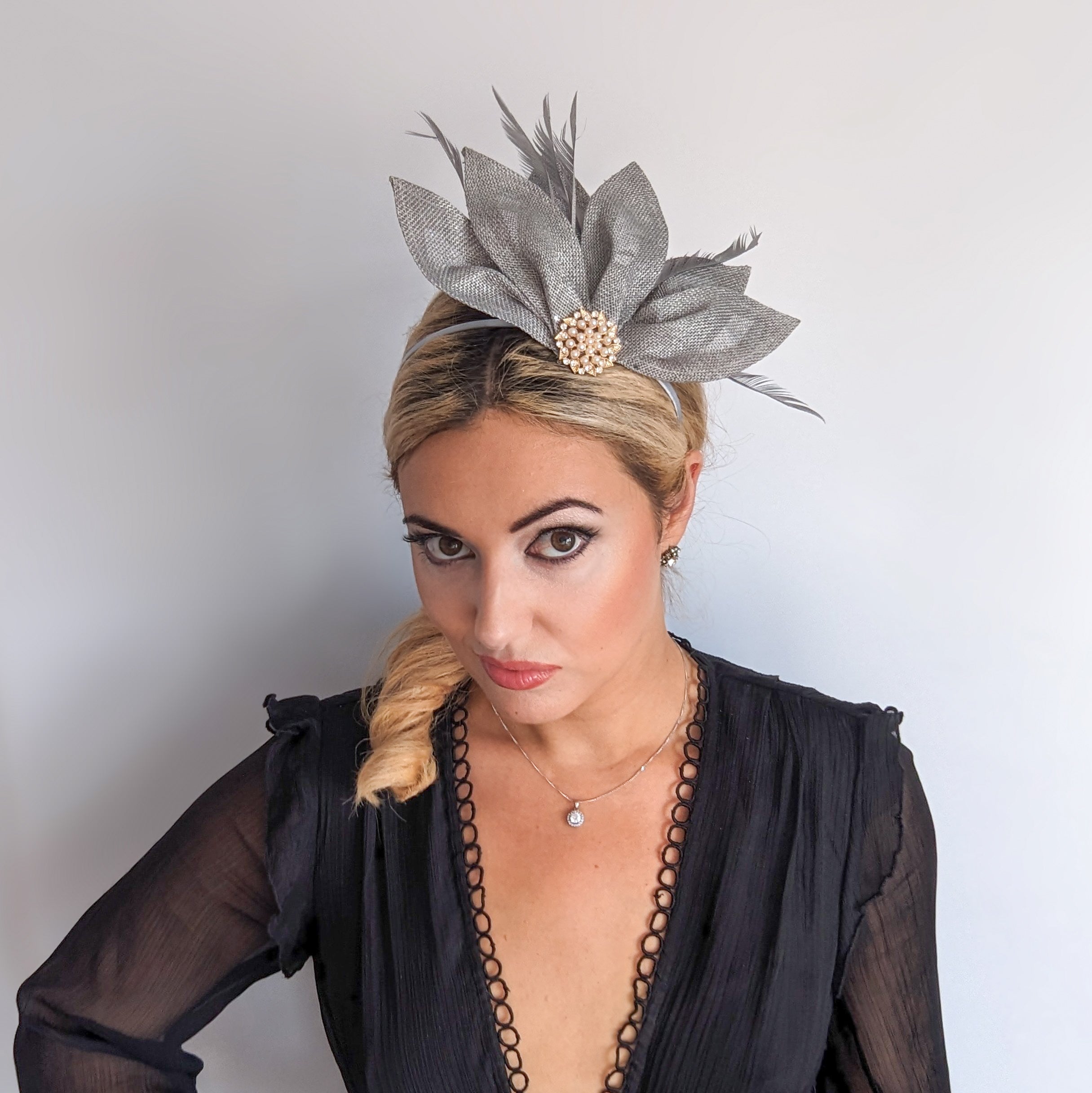 Silver shimmer feather petal fan fascinator hat