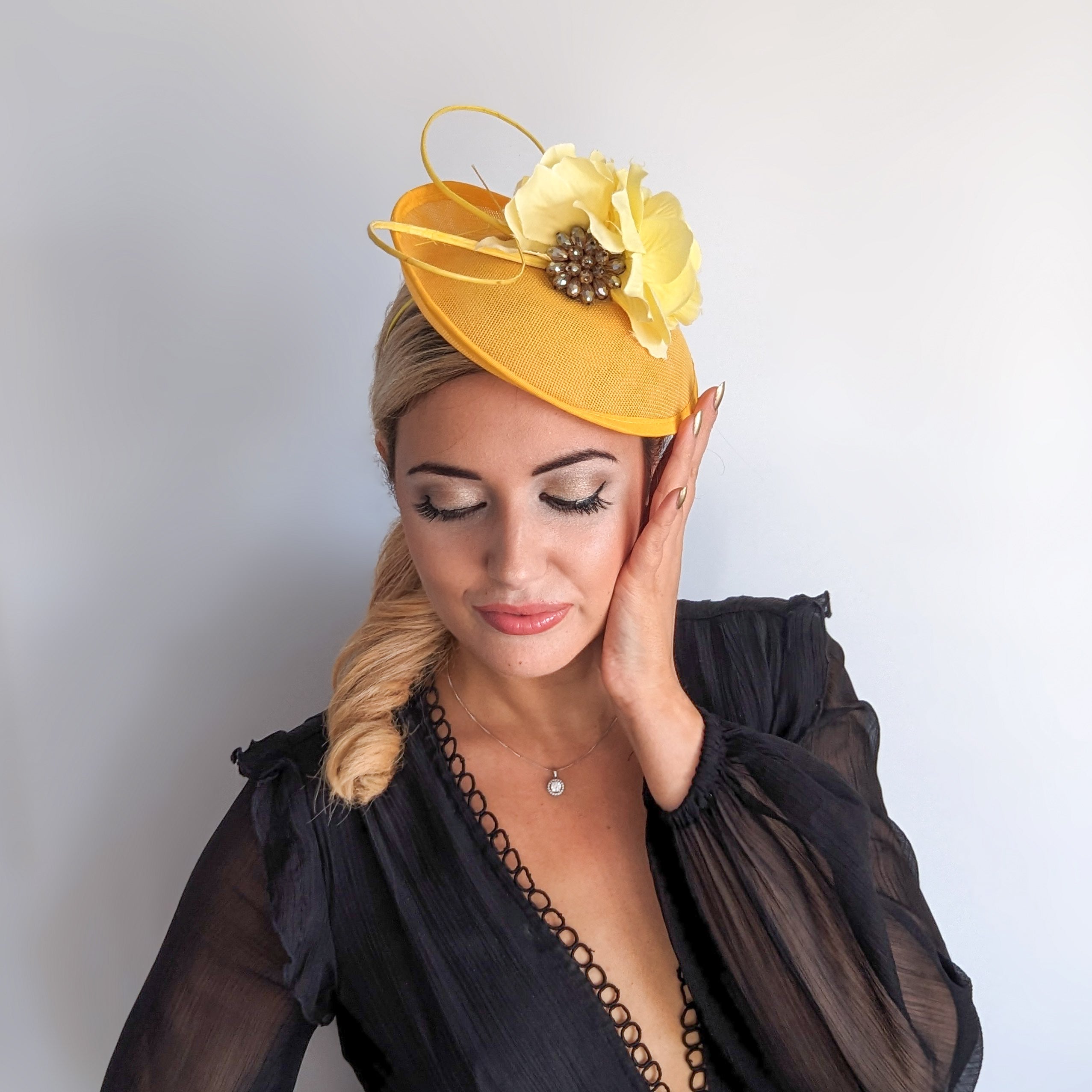 Yellow flower disc saucer fascinator hat