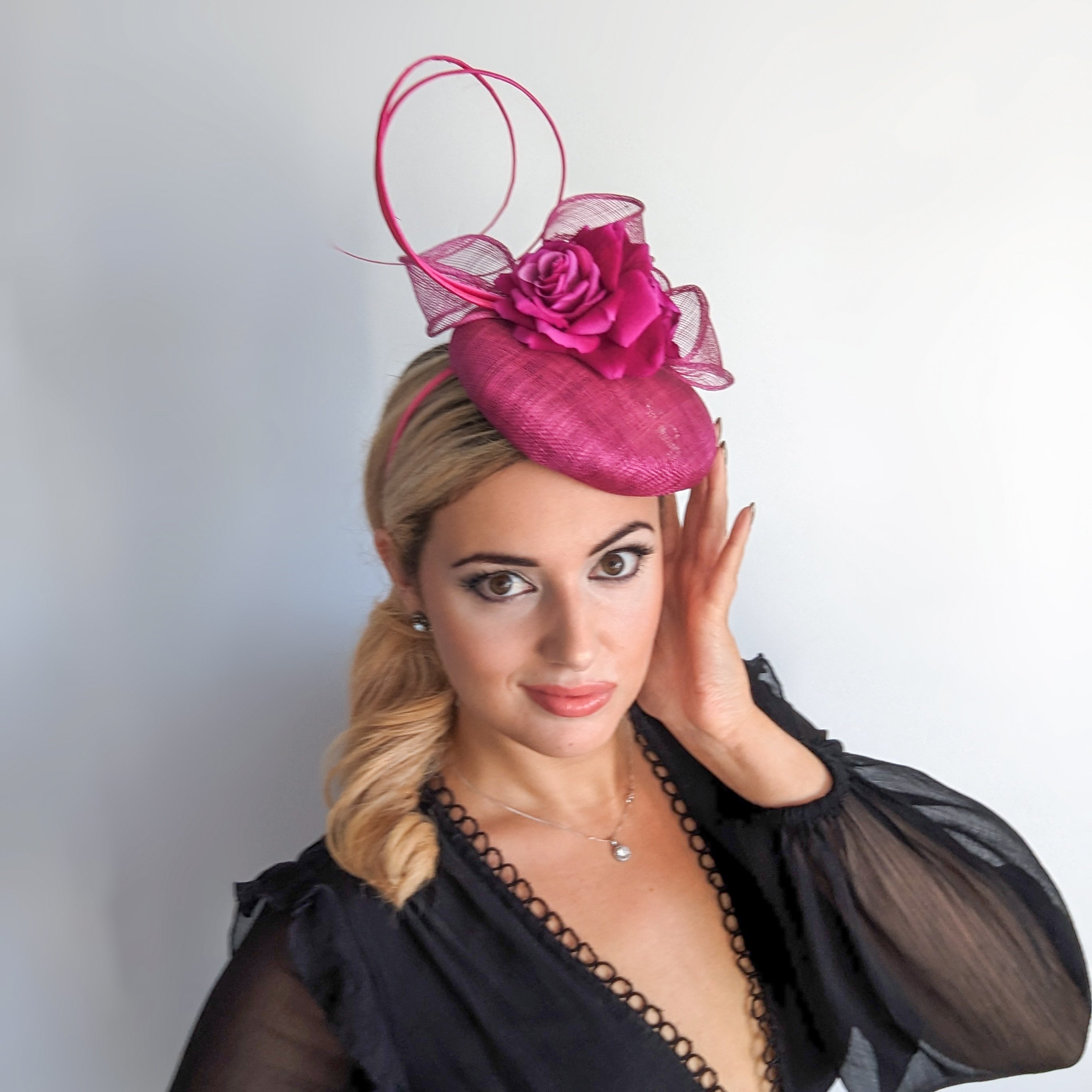 Magenta pink flower fascinator hat