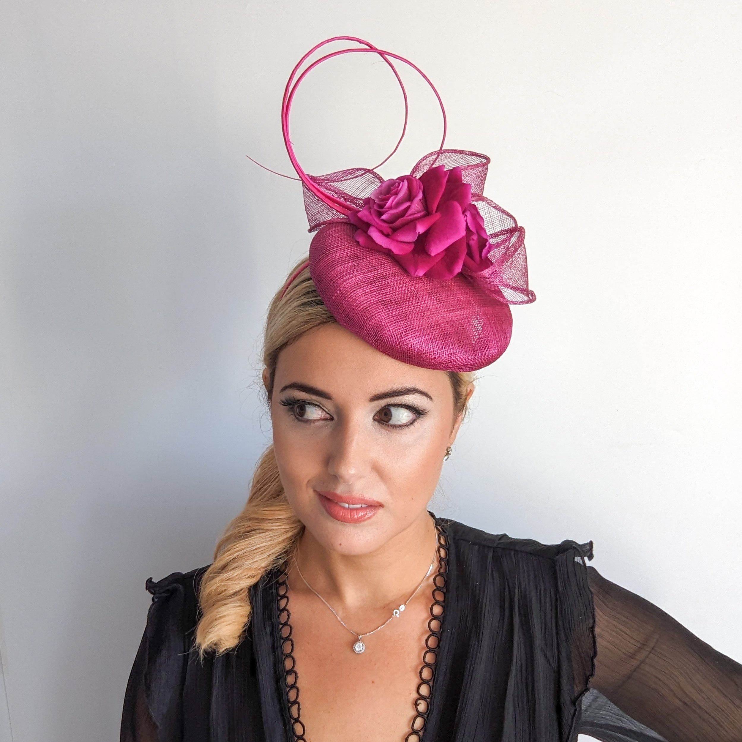 Magenta pink flower fascinator hat