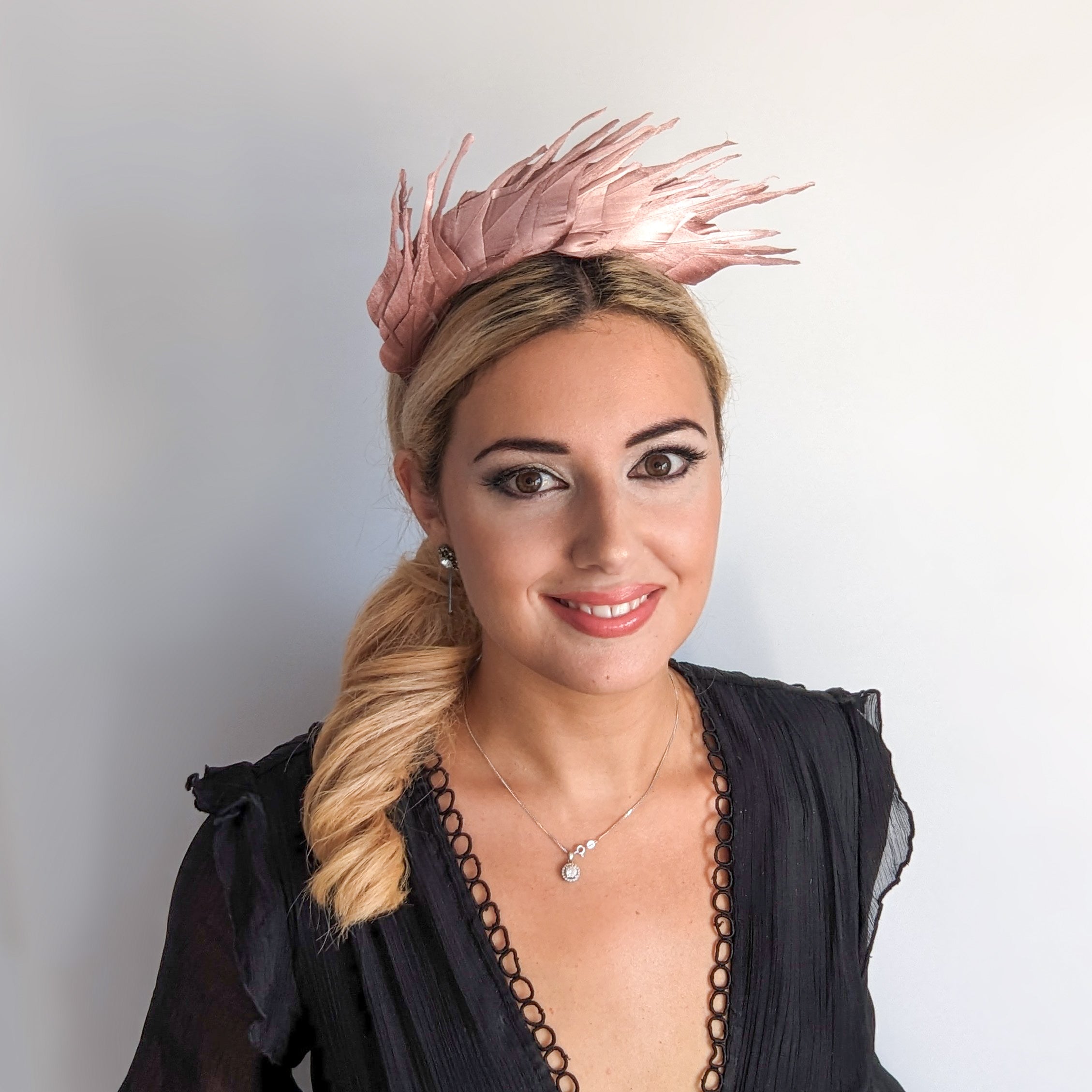 Rose gold metallic shimmer feather headband fascinator