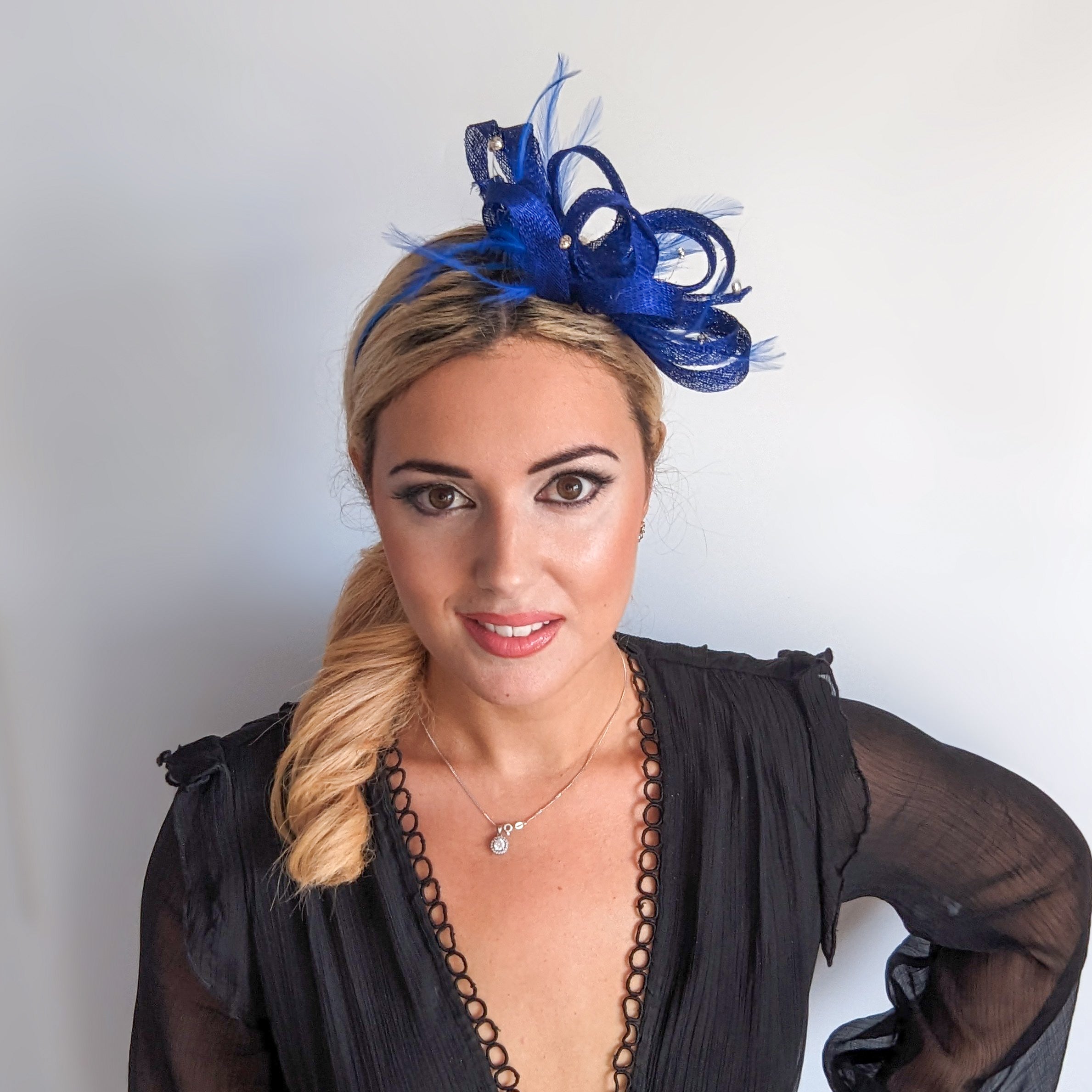 Royal cobalt blue crystal feather fascinator hat