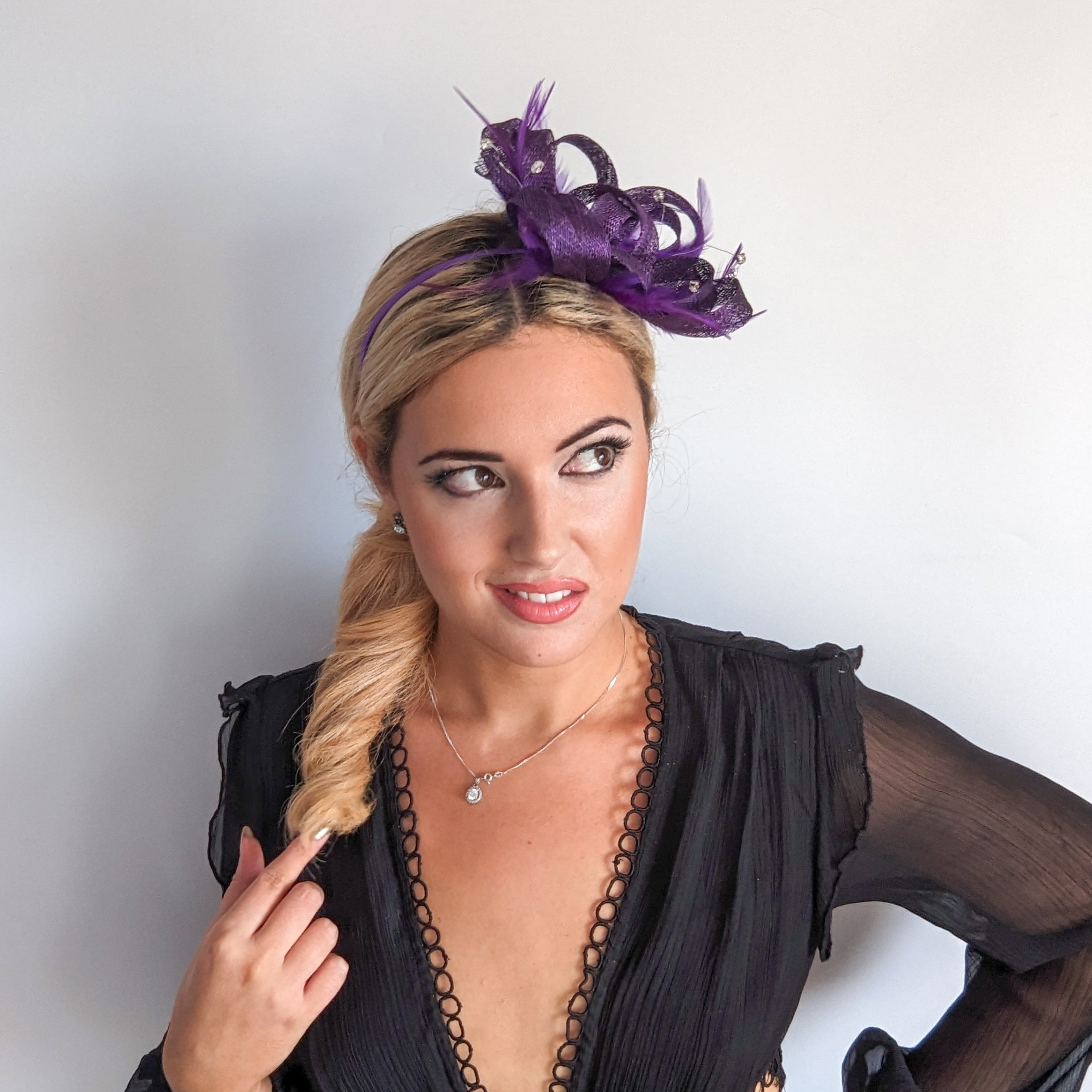 Aubergine cadbury purple crystal feather fascinator hat