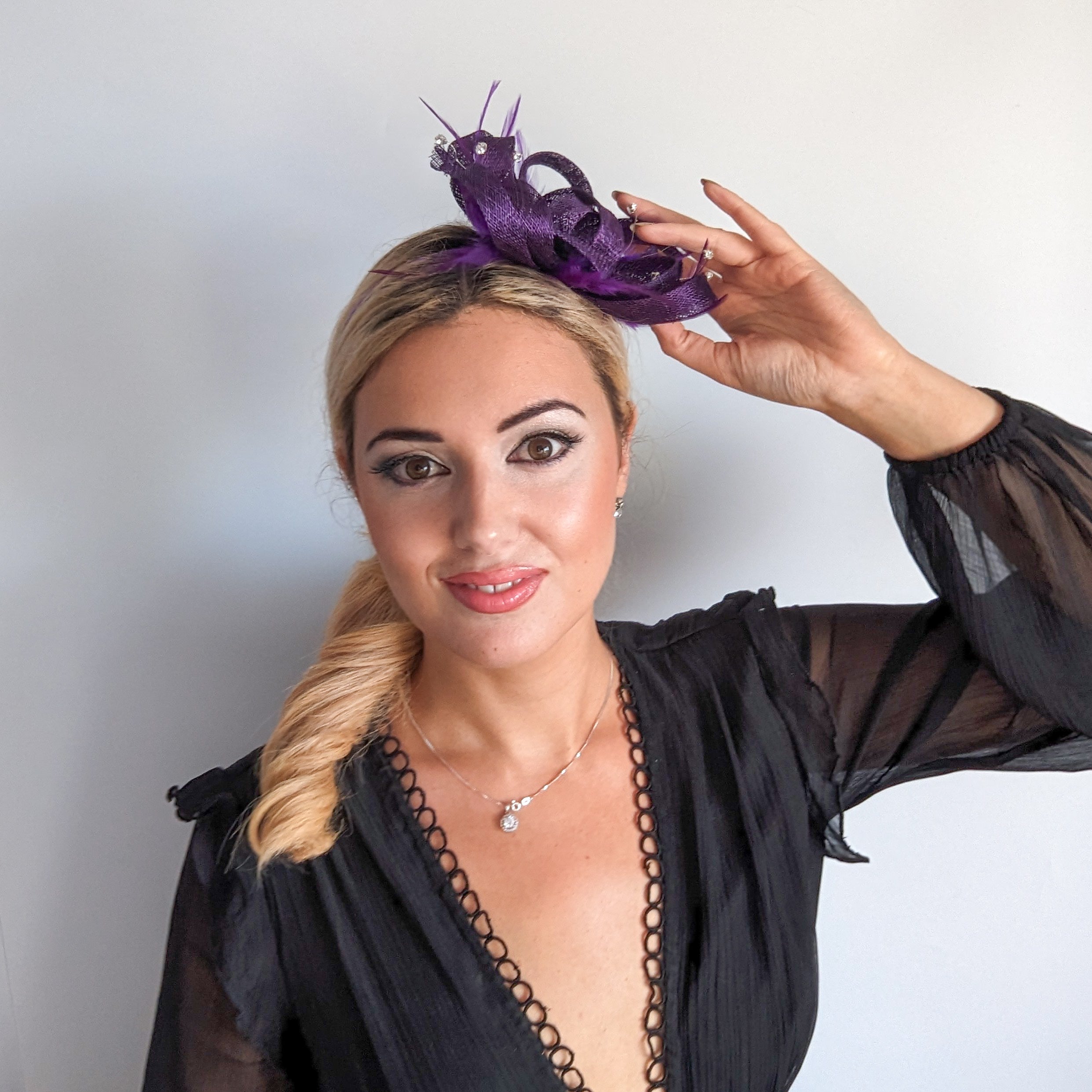 Aubergine cadbury purple crystal feather fascinator hat