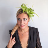 Lime green crystal feather fascinator hat