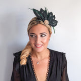 Dark emerald green feather petal fan fascinator hat