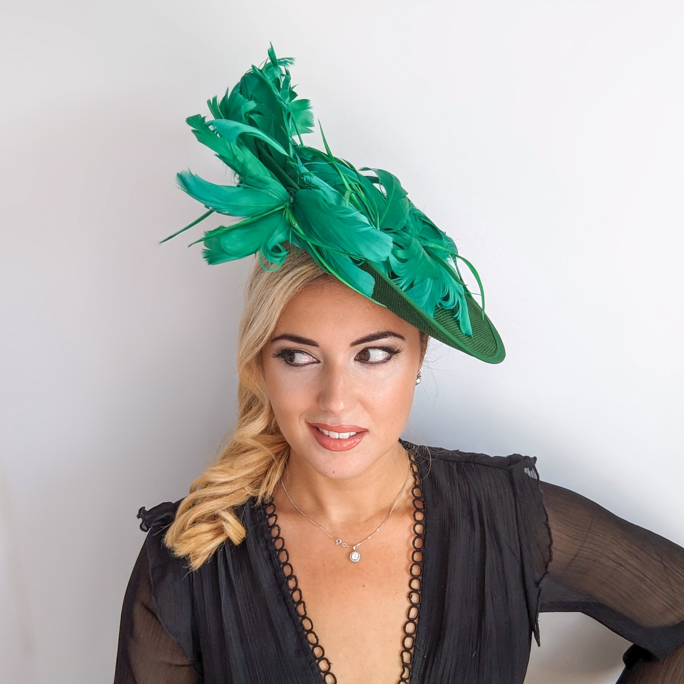 Emerald green feather large saucer disc fascinator hat