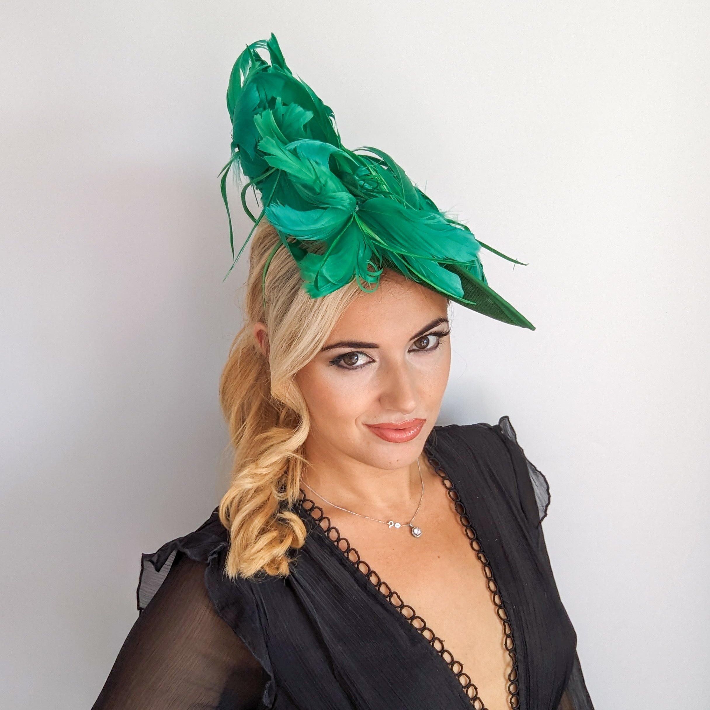 Emerald green feather large saucer disc fascinator hat