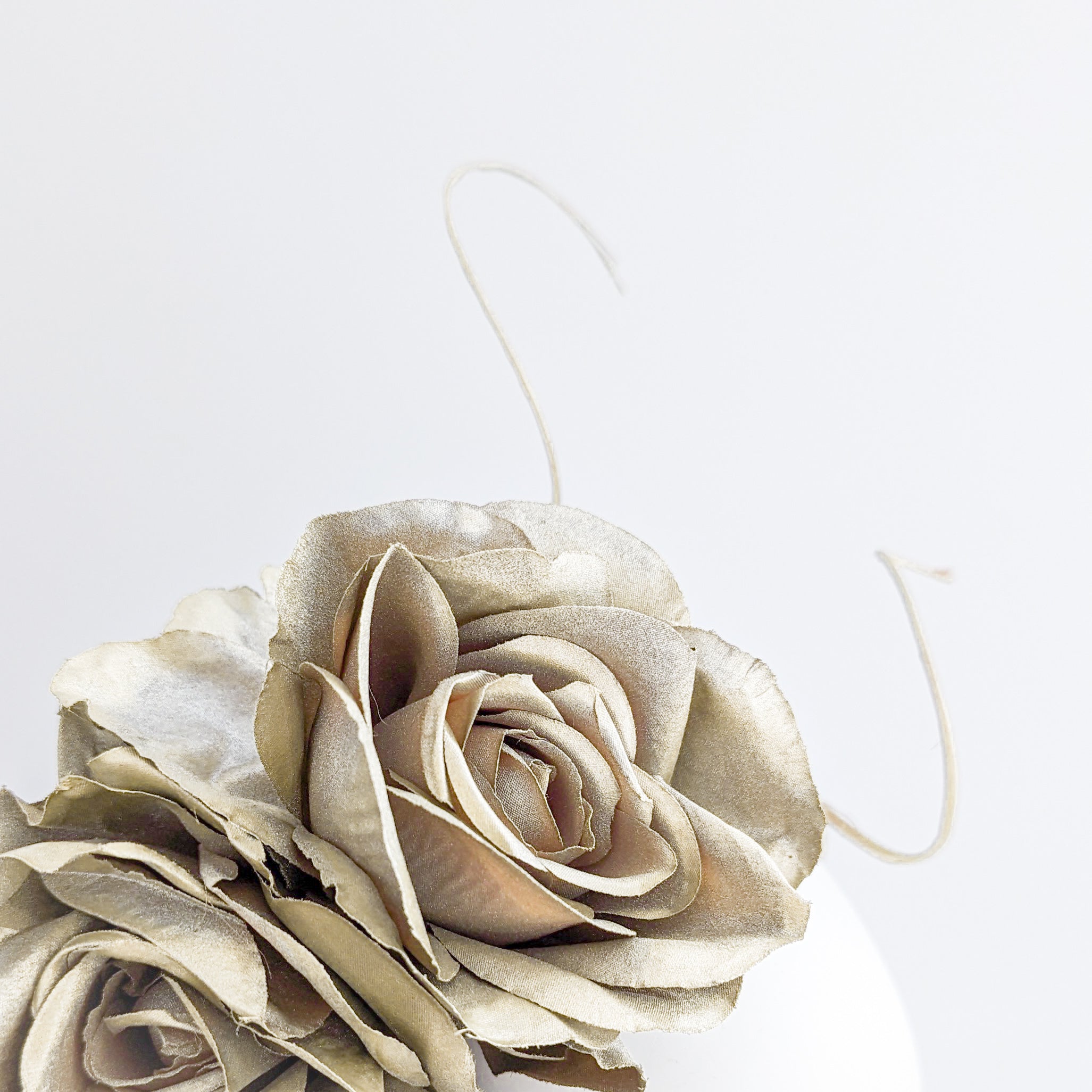 Gold shimmer rose flower fascinator hat