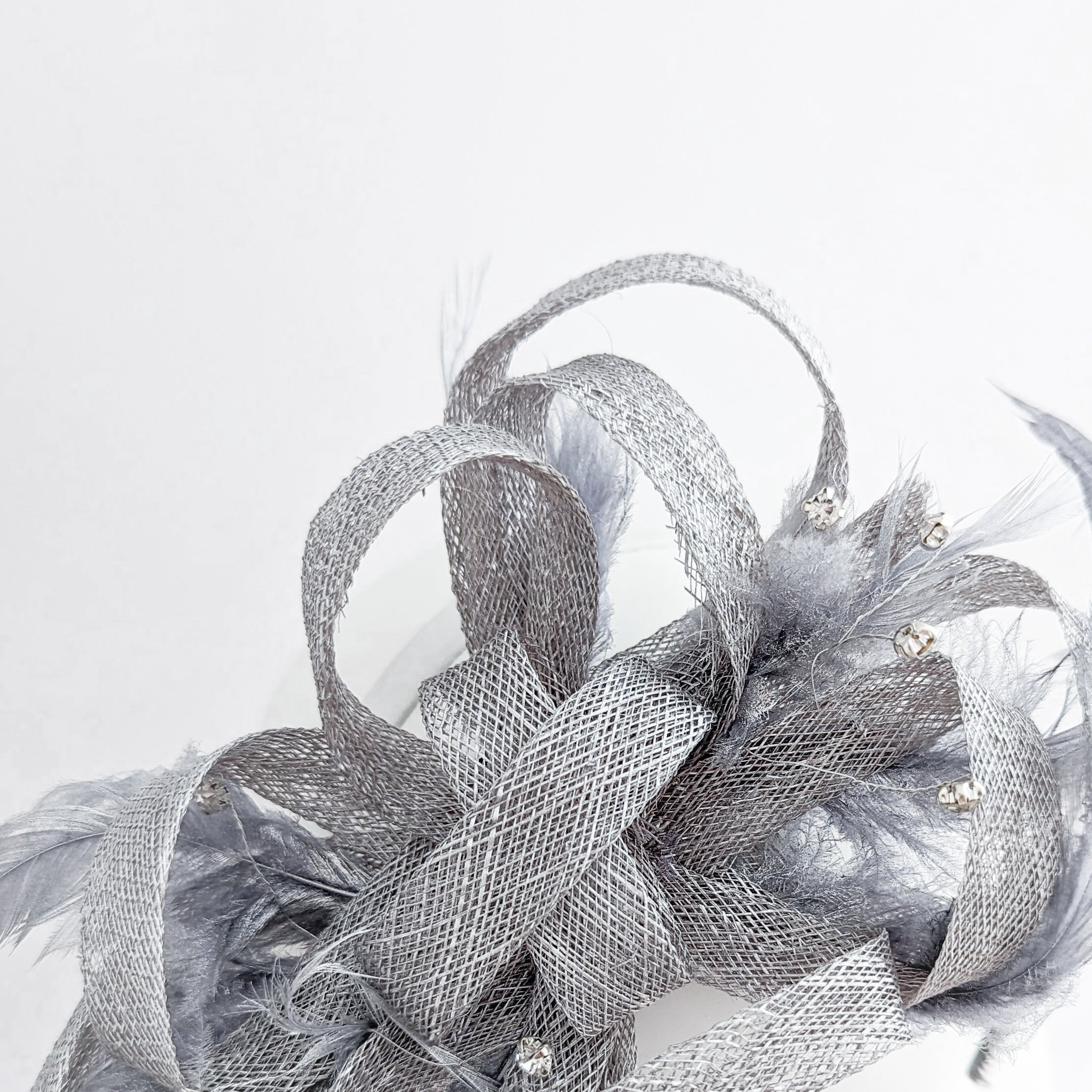 Silver shimmer crystal feather fascinator hat