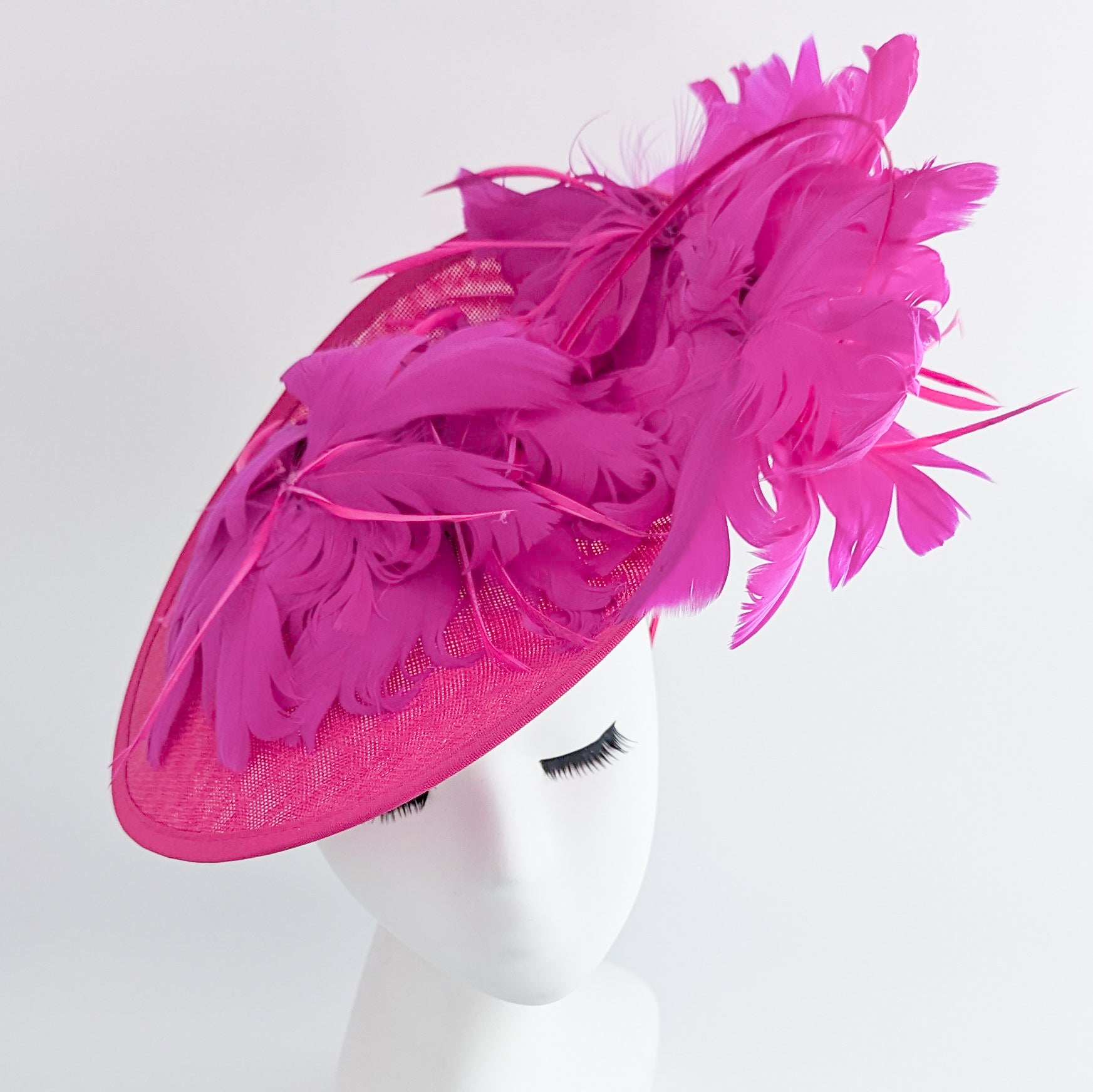 Fuchsia pink large feather saucer disc fascinator hat