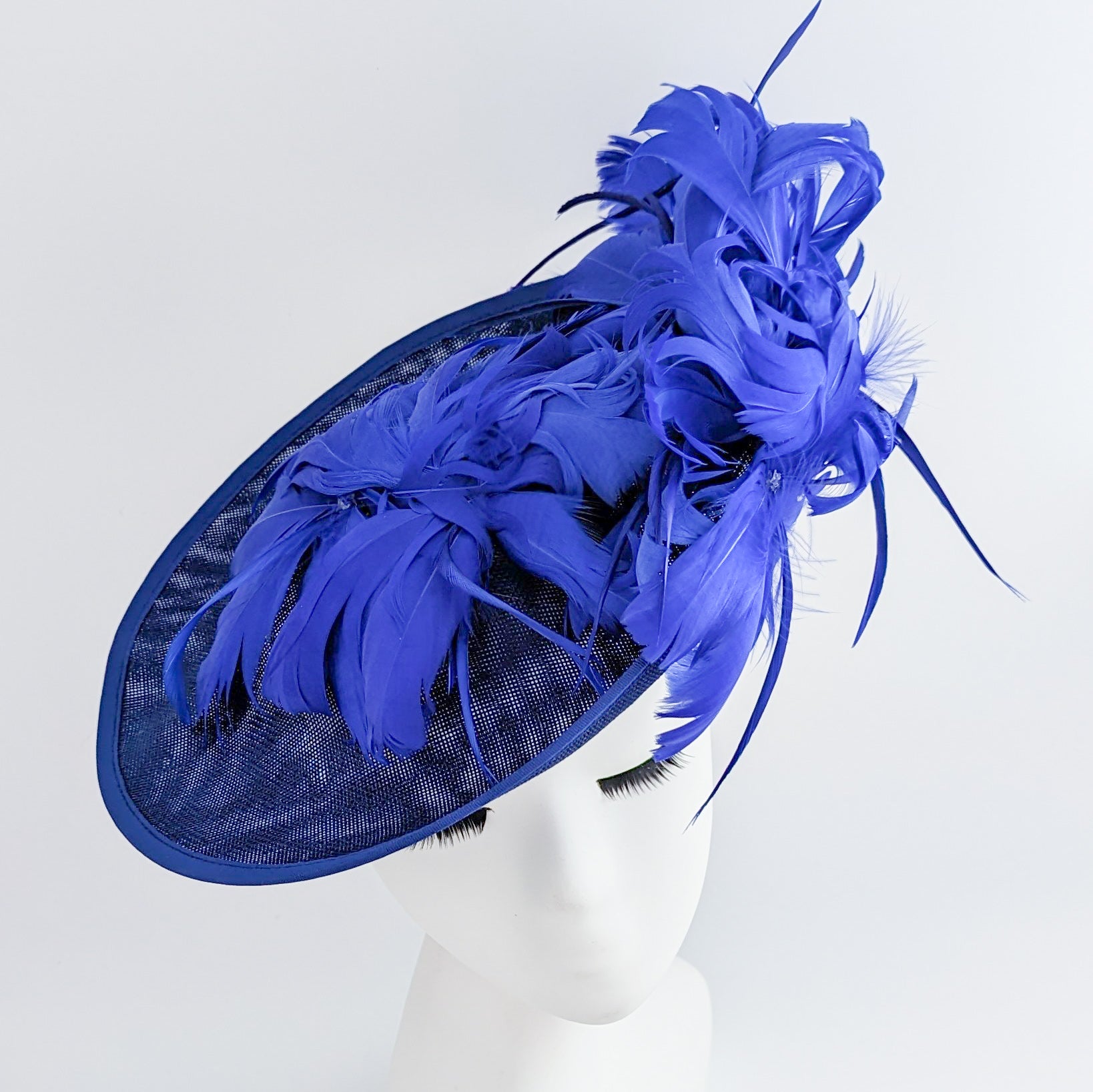 Royal cobalt blue large feather saucer disc fascinator hat