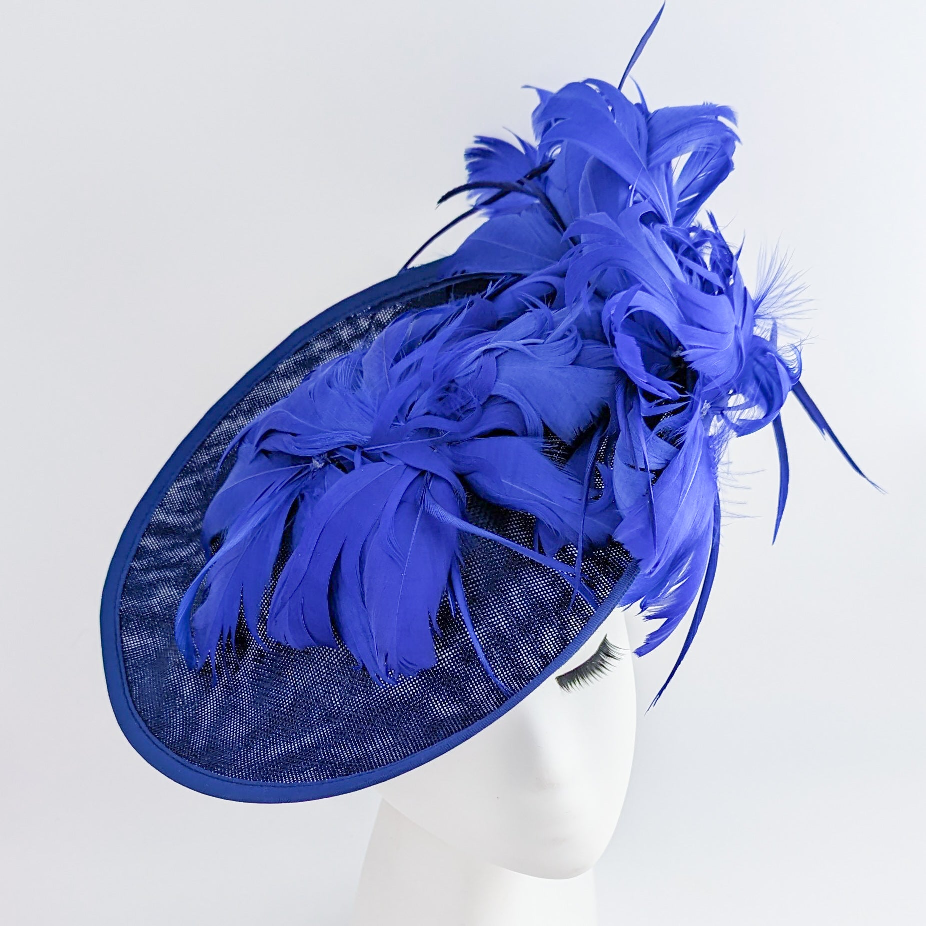 Royal cobalt blue large feather saucer disc fascinator hat