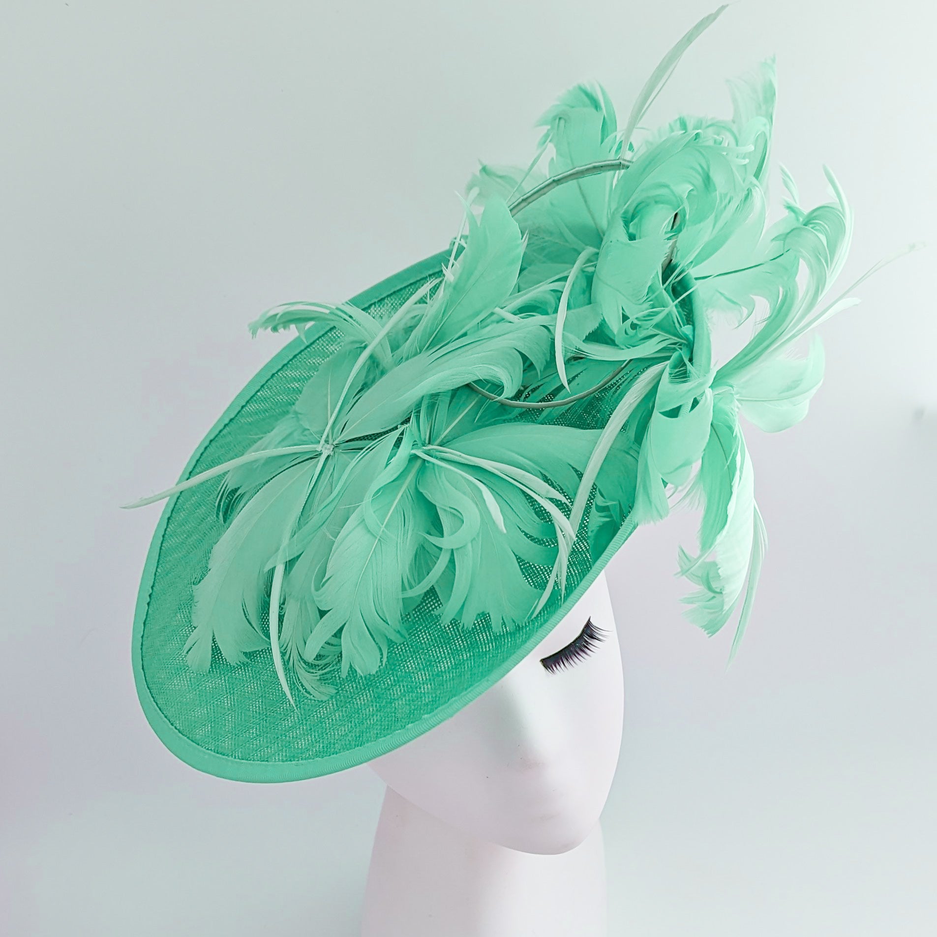 Seafoam mint green feather large saucer disc fascinator hat